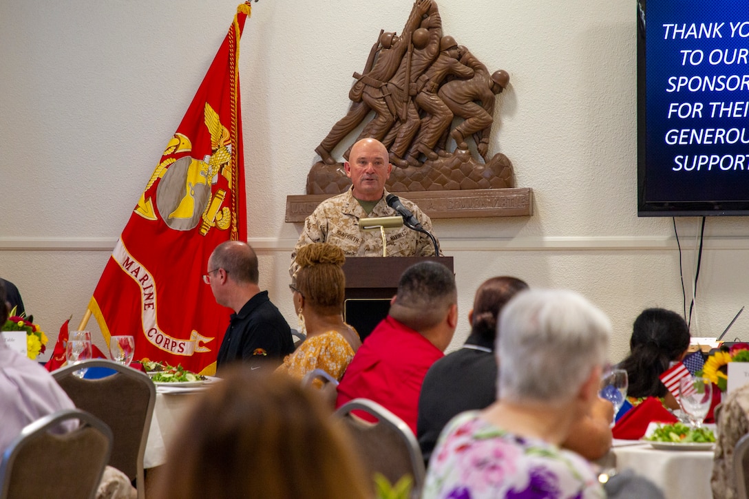 U.S. Marine Corps Maj. Gen. Austin Renforth, commanding general of Marine Air Ground Task Force Training Command, Marine Corps Air Ground Combat Center (MCAGCC), speaks to guests during a Service Members of the Quarter Honoree Luncheon at MCAGCC