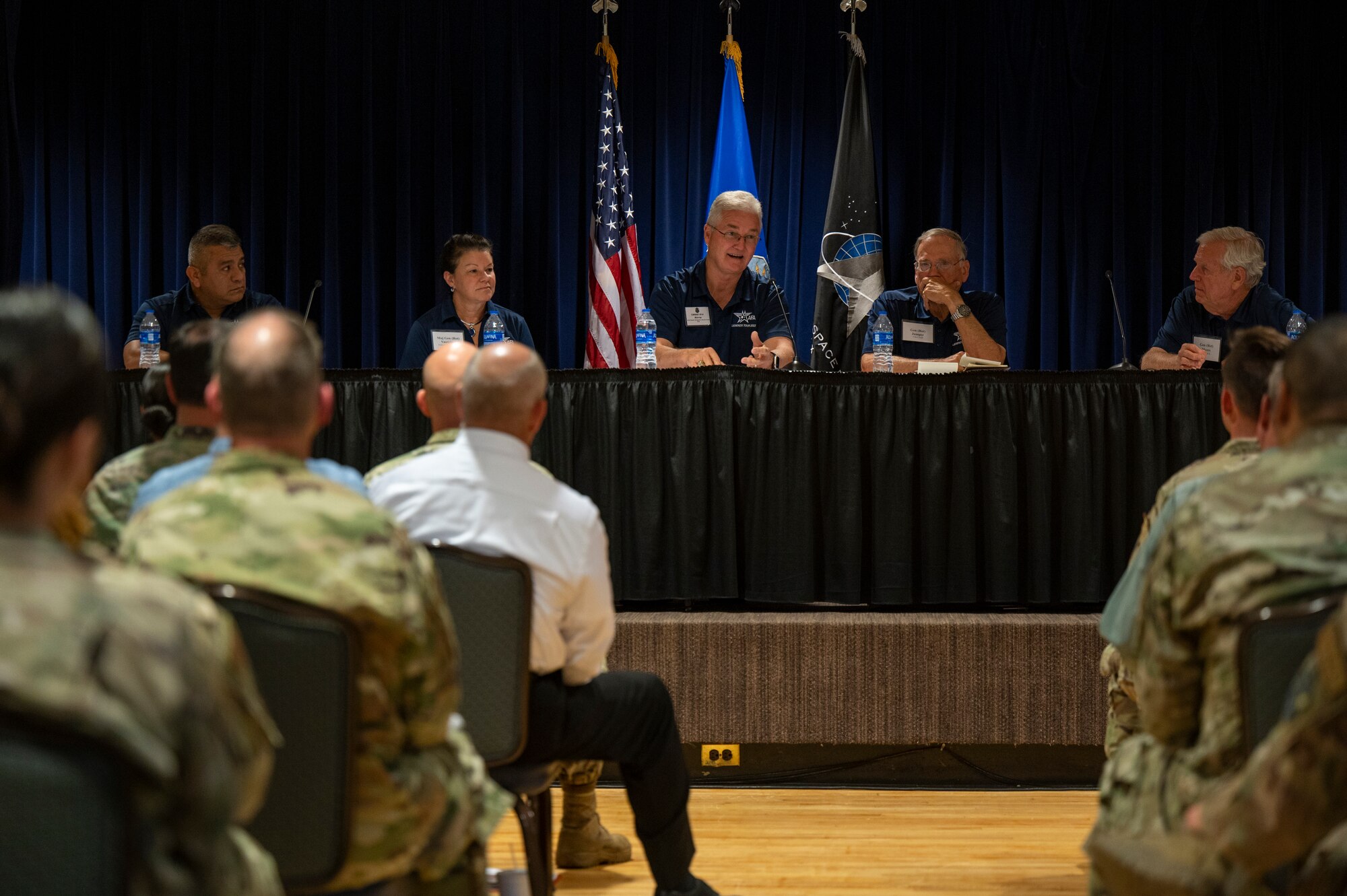 Retired U.S. Air Force Chief Master Sgt. Gerald Murray, 14th Chief Master Sergeant of the Air Force, middle, responds to audience questions during the Air and Space Forces Association’s 75th Anniversary Legends tour at Peterson Space Force Base, Colorado, Aug. 31, 2022.  Murray grew up in Boiling Springs, North Carolina, and entered the U.S. Air Force in October 1977. His background includes various duties in aircraft maintenance, and time as a command chief master sergeant at wing, Numbered Air Force and major command levels. His assignments include bases in Florida, South Carolina, Washington and Georgia. Murray also served overseas in Turkey and Japan, and deployed in support of Operations Desert Storm and Southern Watch. Before assuming position of CMSAF, he served as Command Chief Master Sergeant, Pacific Air Forces, Hickam Air Force Base, Hawaii. He was appointed to the position of CMSAF on July 1, 2002. (U.S. Space Force photo by Airman 1st Class Aaron Edwards)