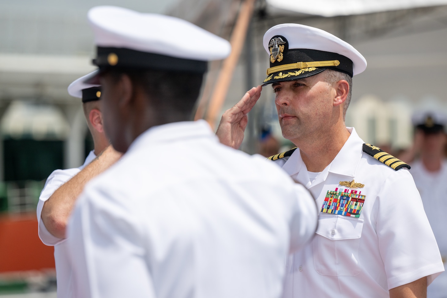 Capt. Tim LaBenz, commodore, Destroyer Squadron (DESRON) 7, departs after assuming command of DESRON 7 during the change of command ceremony aboard the Independence-variant littoral combat ship USS Charleston (LCS 18) in Singapore, Sept. 2, 2022. Charleston, part of DESRON 7, is on a rotational deployment, operating in the U.S. 7th Fleet area of operations to enhance interoperability with partners and serve as a ready-response force in support of a free and open Indo-Pacific region. As the U.S. Navy’s destroyer squadron forward-deployed in Southeast Asia, DESRON 7 serves as the primary tactical and operational commander of littoral combat ships rotationally deployed to Singapore, Expeditionary Strike Group (ESG) 7’s Sea Combat Commander, and builds partnerships through training exercises and military-to-military engagements.