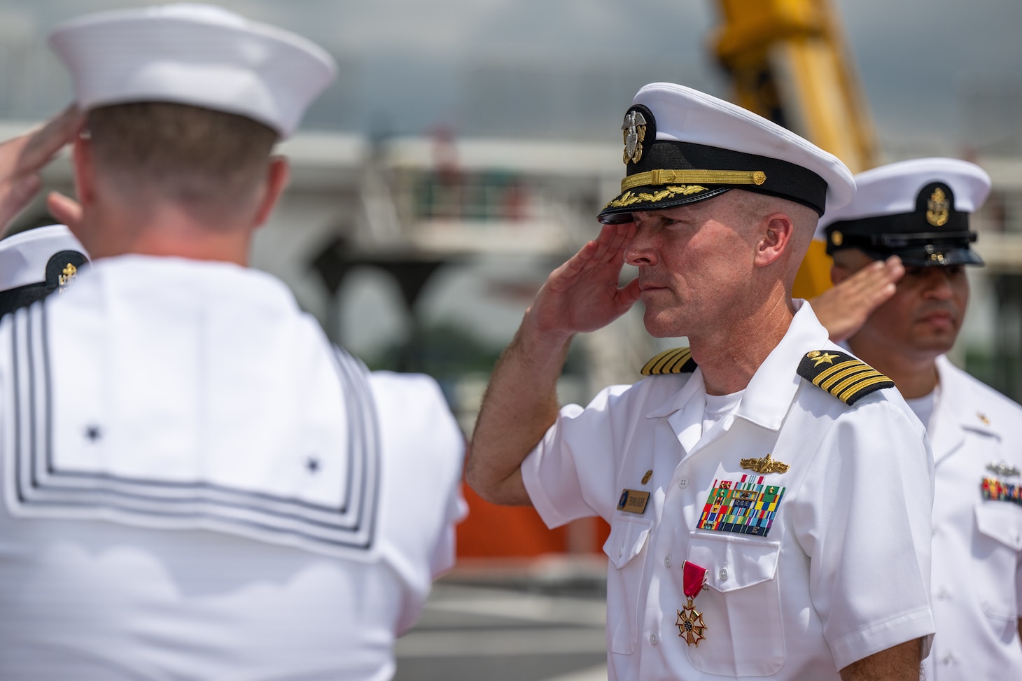 Capt. Tom Ogden departs the change of command ceremony after being relieved by Capt. Tim LaBenz as commodore of Destroyer Squadron (DESRON) 7 aboard the Independence-variant littoral combat ship USS Charleston (LCS 18) in Singapore, Sept. 2, 2022. Charleston, part of DESRON 7, is on a rotational deployment, operating in the U.S. 7th Fleet area of operations to enhance interoperability with partners and serve as a ready-response force in support of a free and open Indo-Pacific region. As the U.S. Navy’s destroyer squadron forward-deployed in Southeast Asia, DESRON 7 serves as the primary tactical and operational commander of littoral combat ships rotationally deployed to Singapore, Expeditionary Strike Group (ESG) 7’s Sea Combat Commander, and builds partnerships through training exercises and military-to-military engagements.