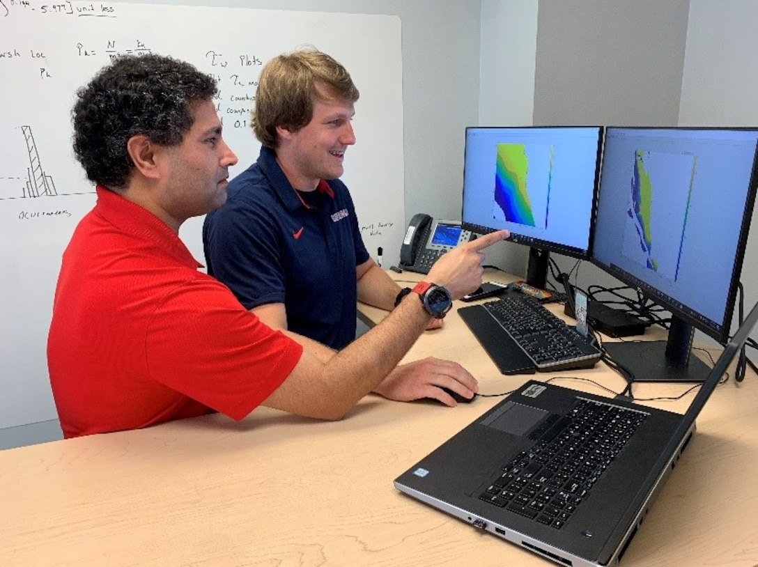 U.S. Army Corps of Engineers San Francisco District coastal engineer Spencer Harper, right, and his mentor, Dr. Gaurav Savant, a research hydraulic engineer with the U.S. Army Engineer Research and Development Center (ERDC), discuss wave generated bed shear stress in the San Francisco Bay while working on Harper’s project as a participant in the ERDC’s detail program, ERDC University.