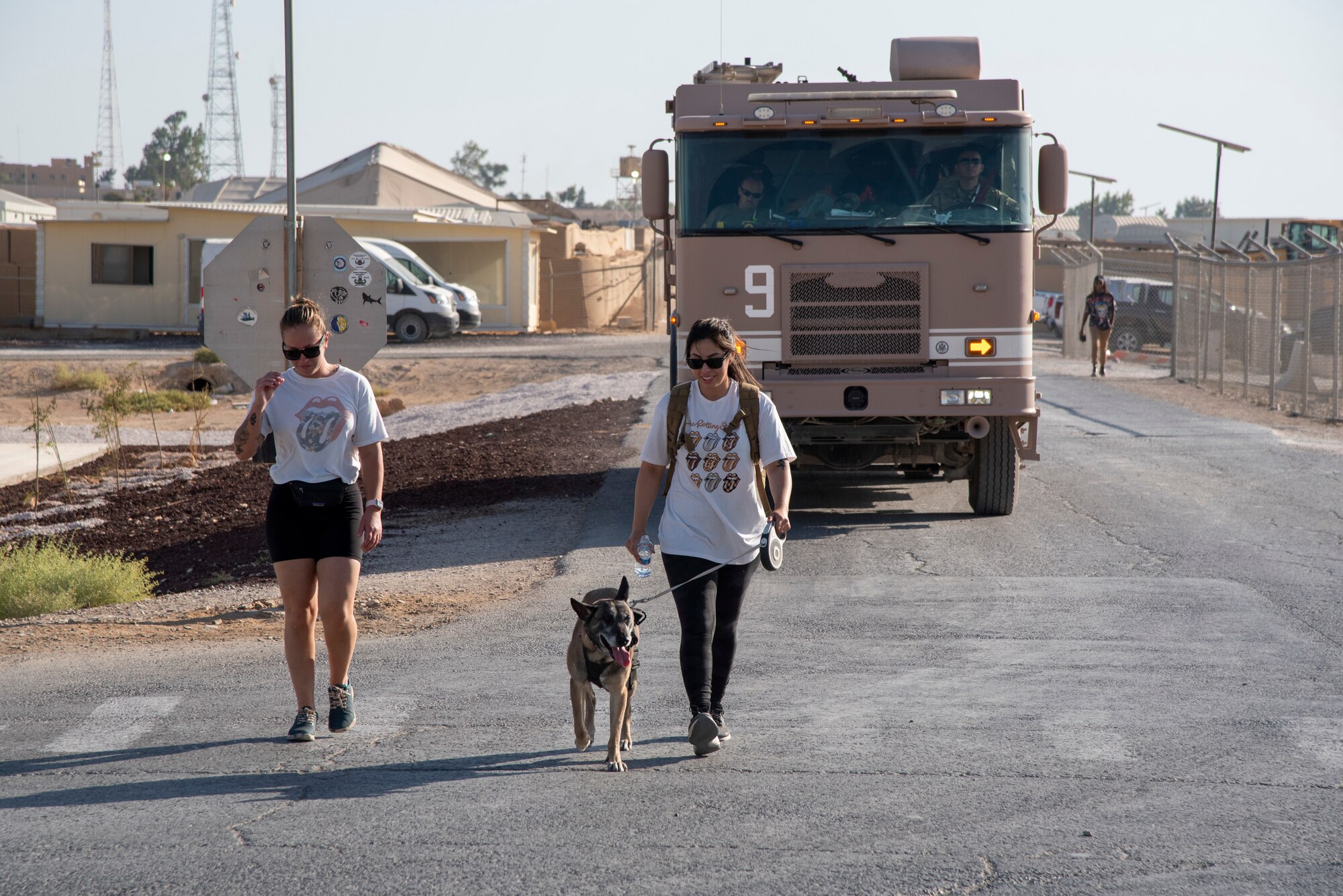 Airmen with the 332d Aerial Expeditionary Wing participate in a five kilometer run, brunch and barbecue dinner in honor of Women's Equality Day at an undisclosed location in Southwest Asia, August 26, 2022.