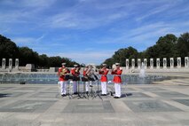 On Friday, Sept. 2, 2022, a Marine Brass Quintet supported a ceremony commemorating the 77th anniversary of V-J Day, the Allied Forces Victory in the Pacific and the end of World War II. Coordinated by the Friends of the National World War II Memorial, event supporters paid tribute to the Greatest Generation at the National World War II Memorial in Washington, D.C.
