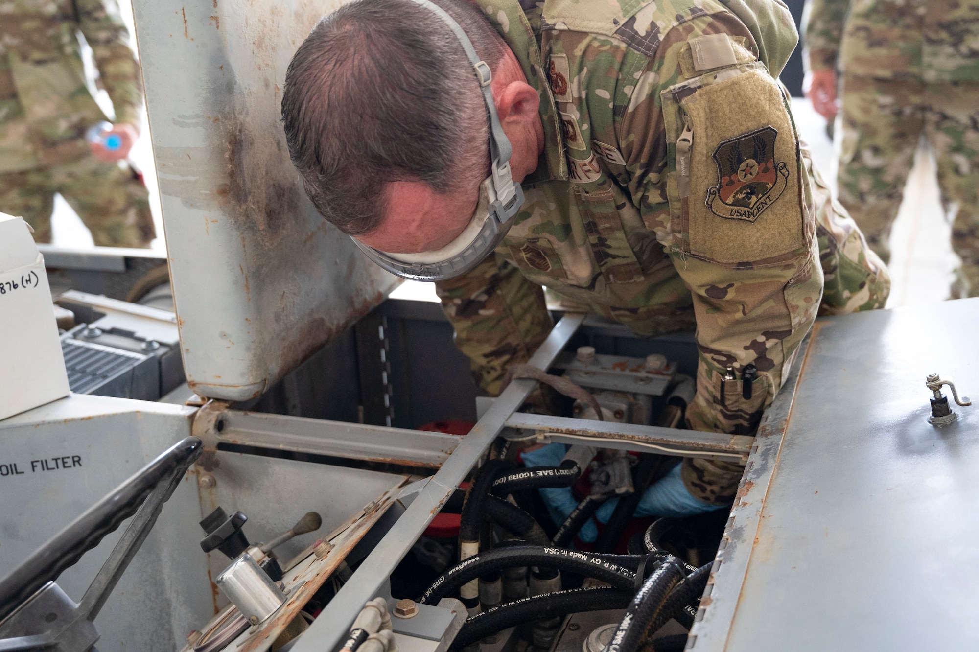 U.S. Air Force Brig. Gen. Ryan Messer and 332d Aerial Expeditionary Wing leadership visit the fabrication shop, 332d Aerospace Ground Equipment at an undisclosed location in Southwest Asia, August 22, 2022. AGE is responsible for repairing, fabricating or replacing the parts and equipment needed to carry out flight missions. These immersion visits provide greater insight into the unique skillsets every airman brings to the 332d AEW Red Tail team. (U.S. Air Force photo by: 1st Lt. Michael Luangkhot)