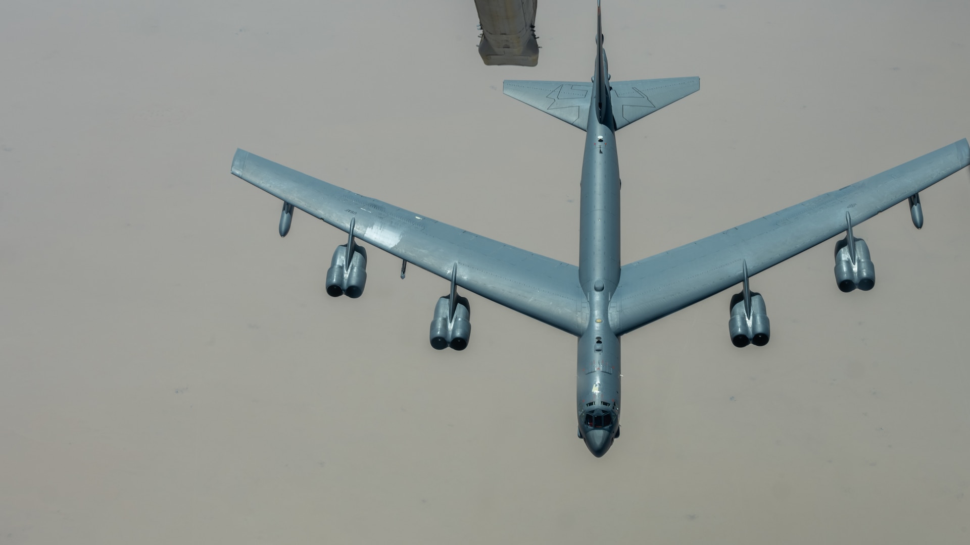 A U.S. Air Force B-52H Stratofortress, assigned to the 5th Bomb Wing, Minot Air Force Base, North Dakota, approaches a KC-10 Extender assigned to the 908th Expeditionary Air Refueling Squadron, Prince Sultan Air Base, Kingdom of Saudi Arabia, for air refueling support, during a Bomber Task Force mission, over the U.S. Central Command area of responsibility, Sept. 4, 2022. BTF missions demonstrate the U.S.’s commitment to regional security and stability by showing how the U.S. will decisively respond to threats against U.S., coalition and partner forces. (U.S. Air Force photo by Staff Sgt. Shannon Bowman)