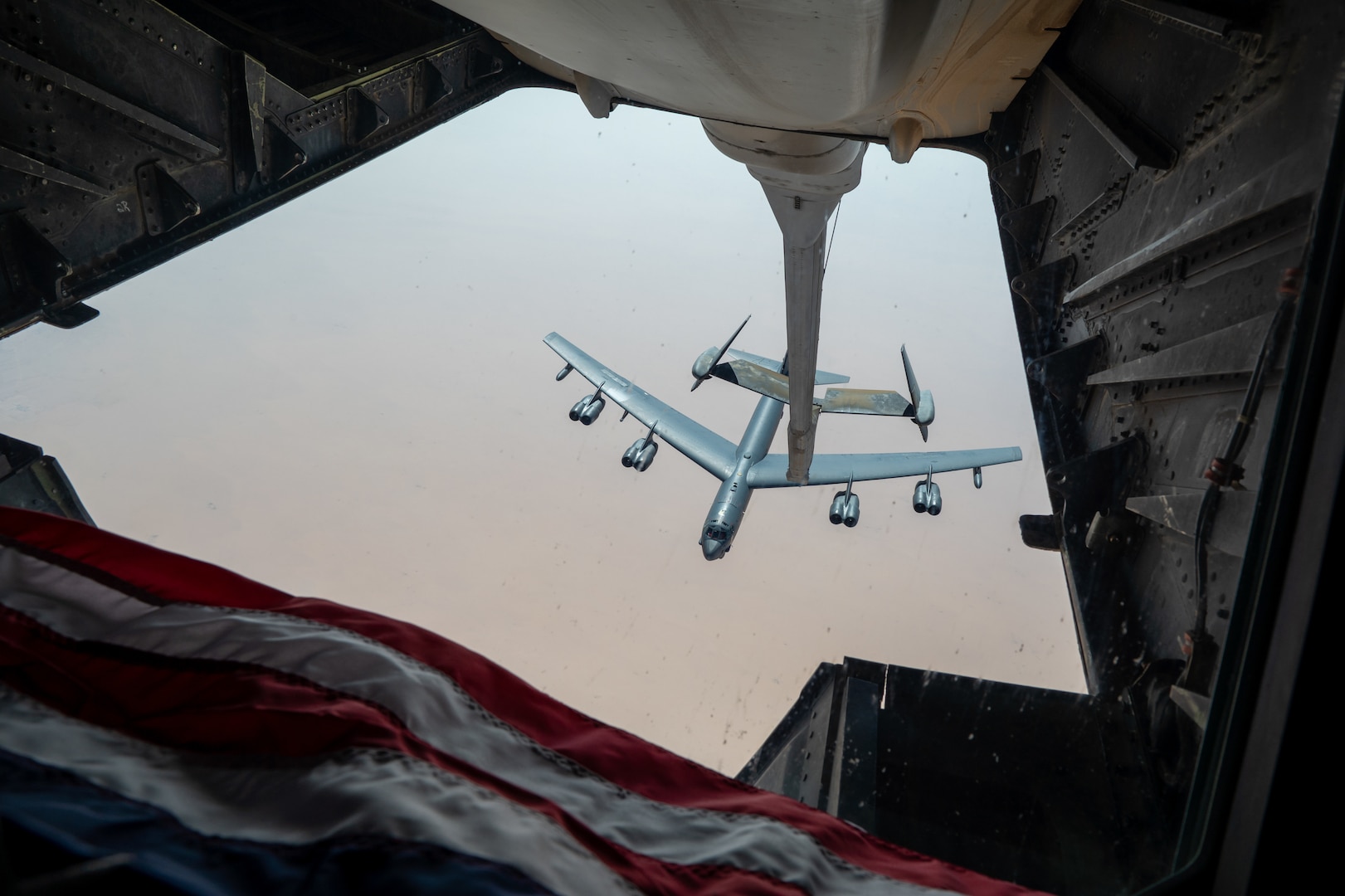 A U.S. Air Force B-52H Stratofortress, assigned to the 5th Bomb Wing, Minot Air Force Base, North Dakota, approaches a KC-10 Extender assigned to the 908th Expeditionary Air Refueling Squadron, Prince Sultan Air Base, Kingdom of Saudi Arabia, for air refueling support, during a Bomber Task Force mission, over the U.S. Central Command area of responsibility, Sept. 4, 2022. BTF missions demonstrate the U.S.’s commitment to regional security and stability by showing how the U.S. will decisively respond to threats against U.S., coalition and partner forces. (U.S. Air Force photo by Staff Sgt. Shannon Bowman)