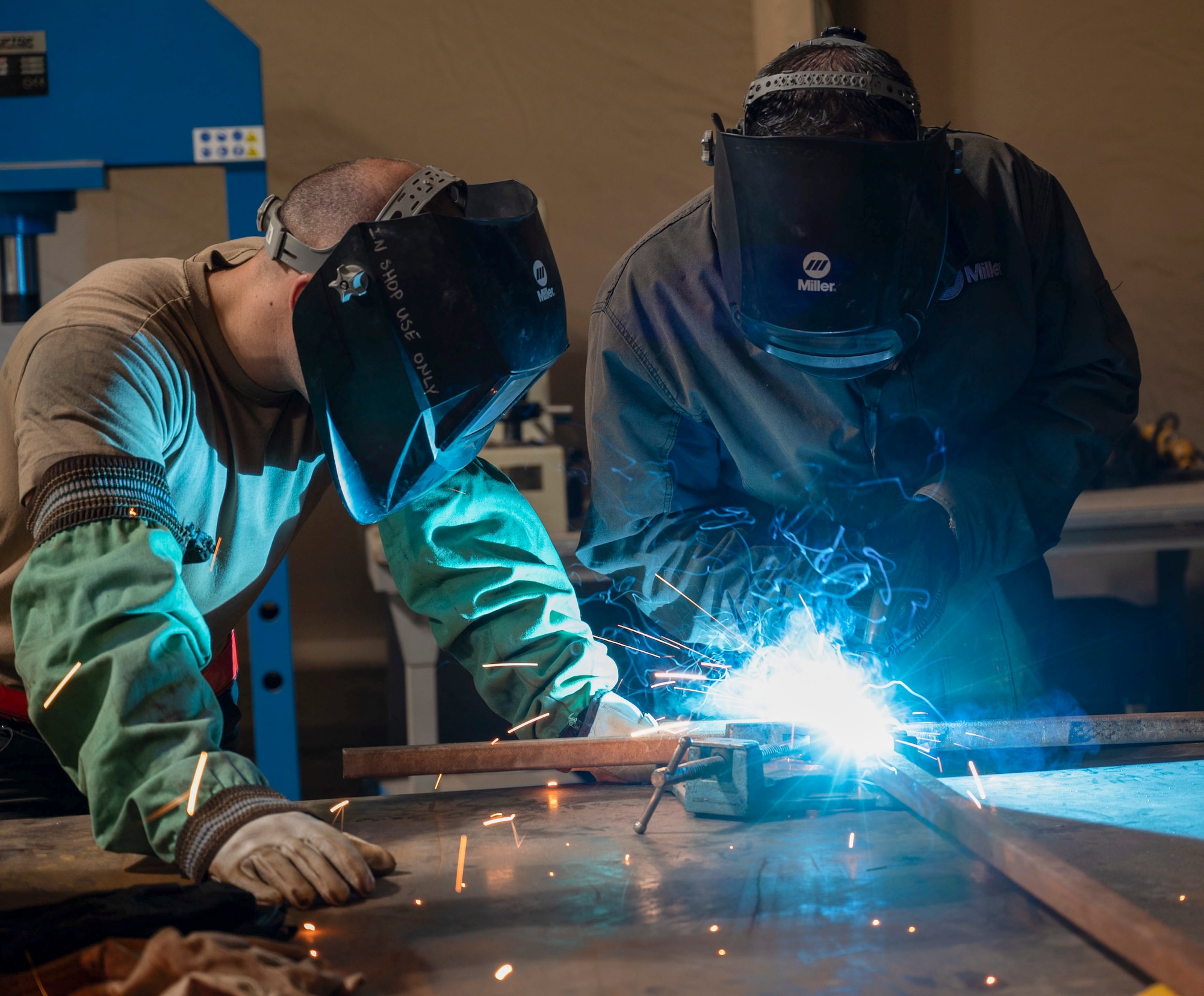 U.S. Air Force Brig. Gen. Ryan Messer and 332d Aerial Expeditionary Wing leadership visit the fabrication shop, 332d Aerospace Ground Equipment at an undisclosed location in Southwest Asia, August 22, 2022. AGE is responsible for repairing, fabricating or replacing the parts and equipment needed to carry out flight missions. These immersion visits provide greater insight into the unique skillsets every airman brings to the 332d AEW Red Tail team. (U.S. Air Force photo by: 1st Lt. Michael Luangkhot)