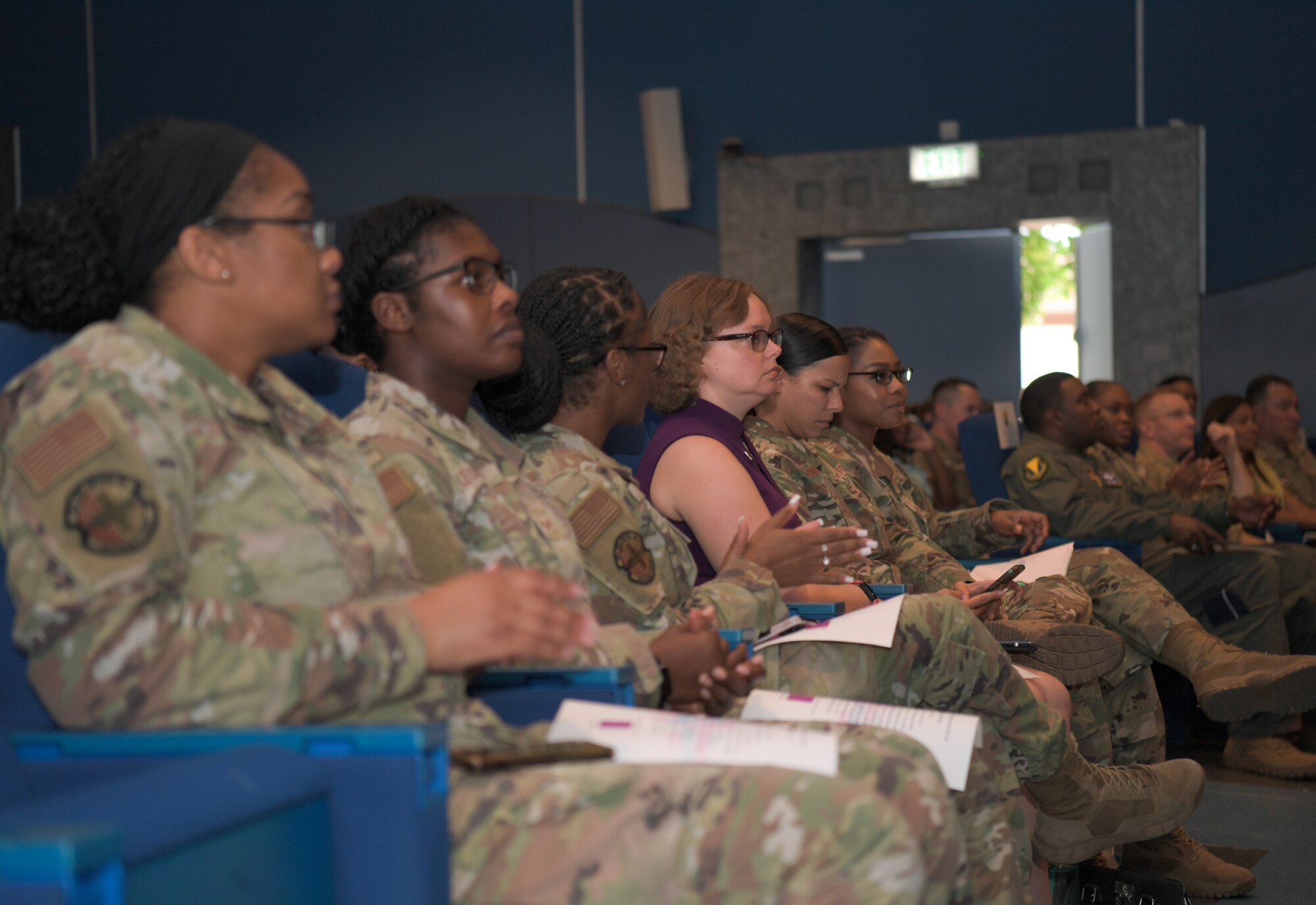 attendees sit in audience