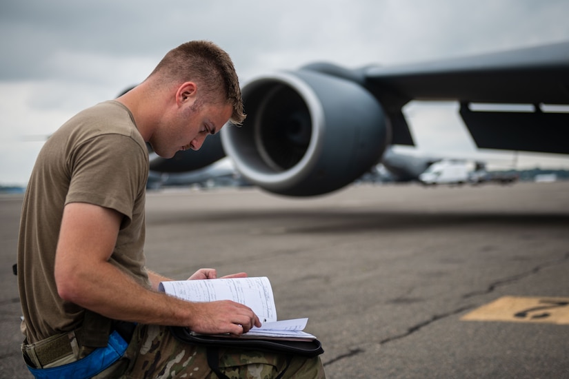 U.S. Air Force Staff Sgt. Garrett Byers, 6th Maintenance Squadron hydraulics specialist from MacDill Air Force Base, Florida, looks over hydraulic procedures during the 6th Air Refueling Wing’s Agile Combat Employment capstone exercise at Joint Base Charleston, South Carolina, Aug. 25, 2022. Joint Base Charleston served as one of the operational hubs during the exercise. (U.S. Air Force photo by Airman 1st Class Christian Silvera)
