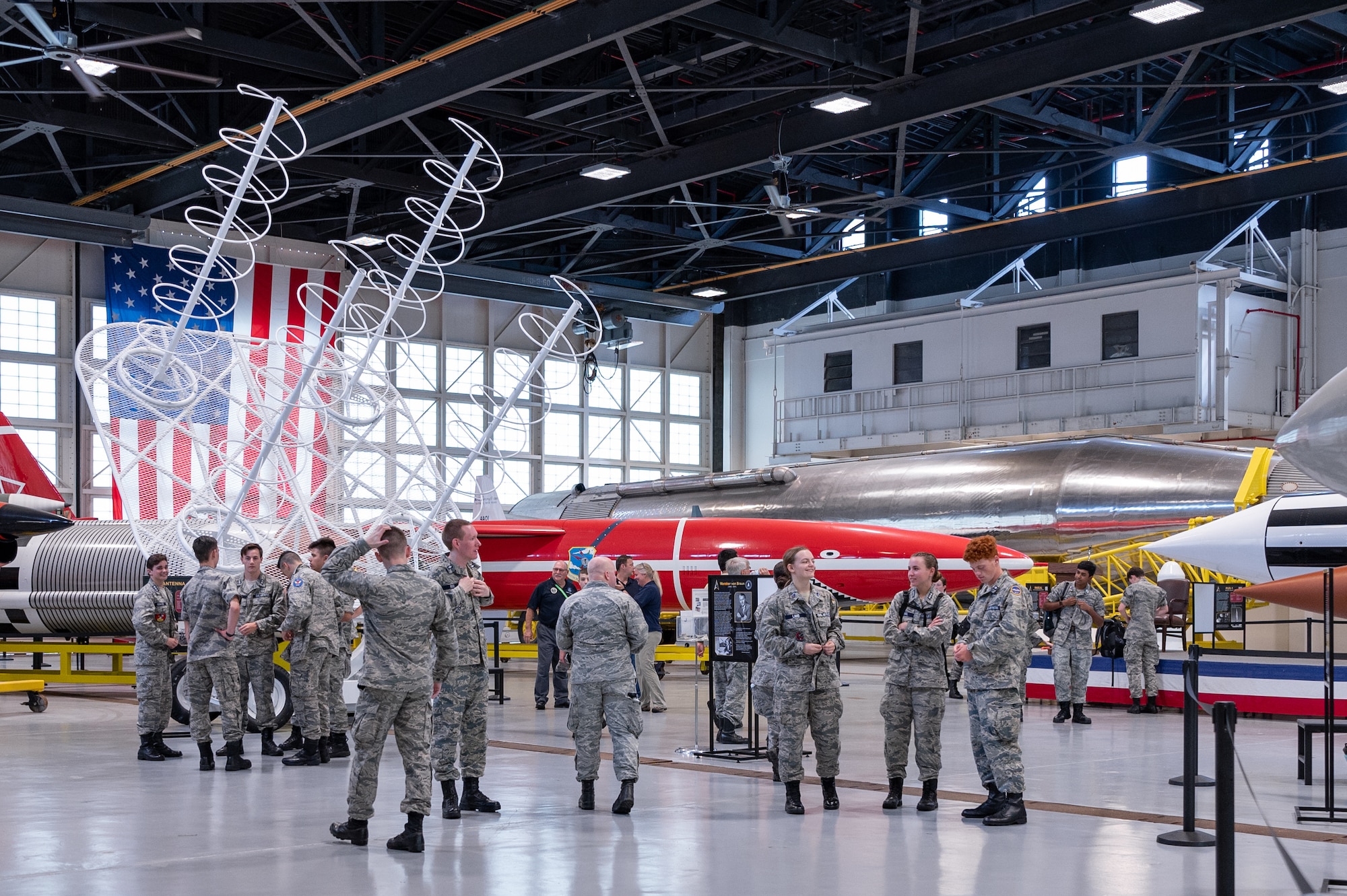 Cadets with the Civil Air Patrol Space Force Operations Academy tour Hangar C, July 26, 2022, at Cape Canaveral Space Force Station, Fla. The group viewed restored launch systems, early winged and ballistic missiles, and boilerplate capsules. (U.S. Space Force photo by Senior Airman Dakota Raub)