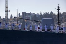 Sailors assigned to Arleigh Burke-class guided-missile destroyer USS Momsen (DDG 92) man the rails as the ship arrives in Naval Station Everett, Washington, Sept. 6. The Momsen, assigned to Carrier Strike Group Three, returned following a seven-month deployment to the U.S. 3rd, 5th and 7th Fleets in support of a free and open Indo-Pacific. (U.S. Navy photo by Mass Communication Specialist 2nd Class Ethan Soto)