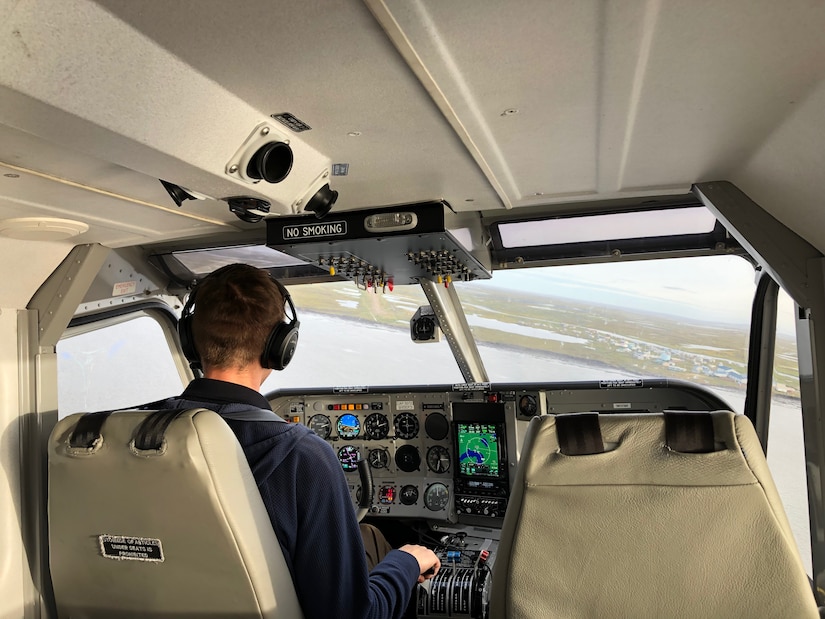 Civil Air Patrol pilot Alex Dupuis prepares to land in Bethel, Alaska, August 29, 2022. Teams comprised of six Coast Guard marine inspectors visited a total of 20 communities and inspected approximately 50 bulk fuel storage facilities August 22-30, with transportation from Bethel to more remote communities provided by three Alaska Army National Guard members and three Civil Air Patrol pilots.