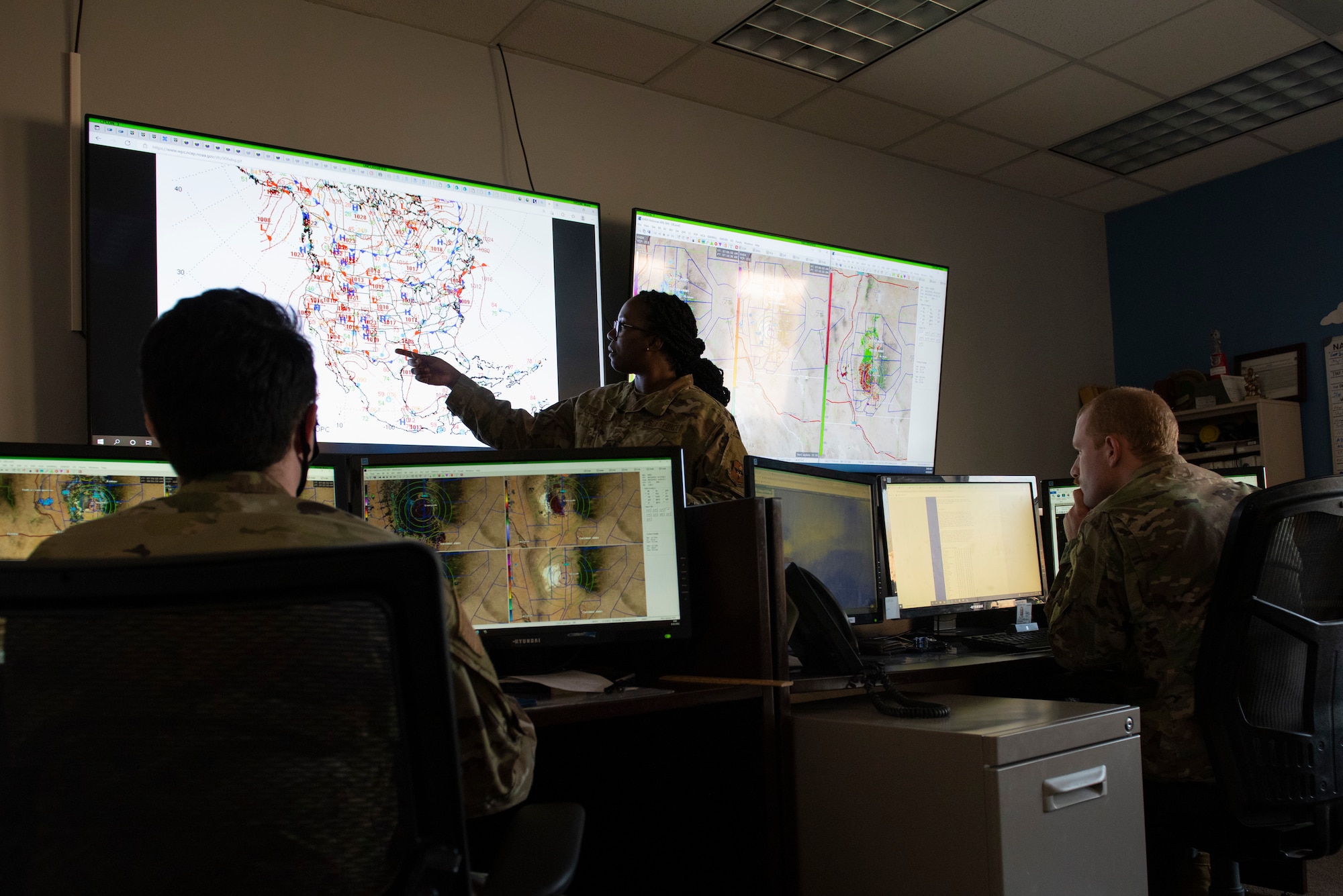 U.S. Air Force Master Sgt. Deshona Crowder, 54th Operations Support Squadron weather flight chief, briefs weather patterns, Aug. 23, 2022, at Holloman Air Force Base, New Mexico. The 54th OSS gives updates on weather conditions and mission locations for six different types of aircraft. (U.S Air Force photo by Airman 1st Class Isaiah Pedrazzini)