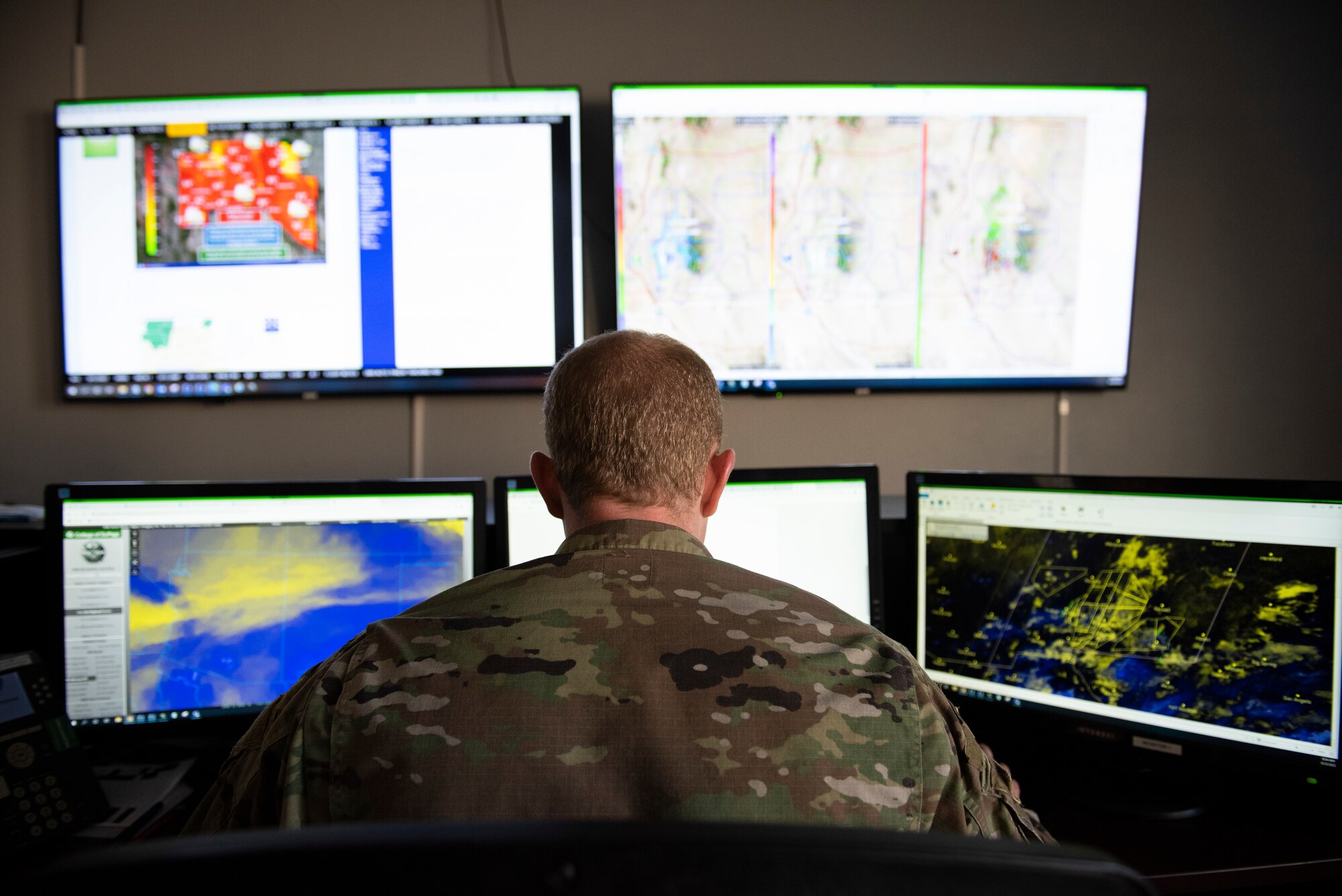 U.S. Air Force Staff Sgt. Brennan Dettinger, 54th Operations Support Squadron weather craftsman, monitors weather patterns, Aug. 23, 2022, at Holloman Air Force Base, New Mexico. The 54th OSS is responsible for the forecast management for the entirety of the base. (U.S Air Force photo by Airman 1st Class Isaiah Pedrazzini)
