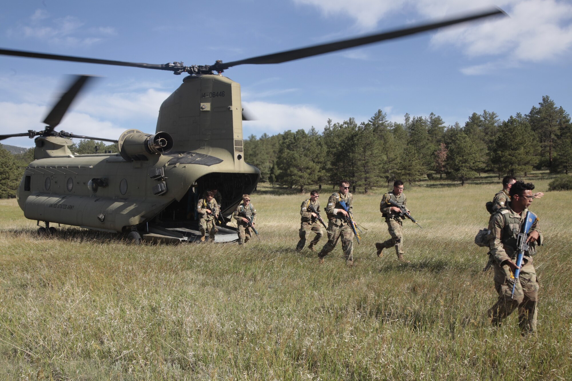 Cadets practice infiltration into an objective area from an Army CH-47 Chinook helicopter assigned to Bravo Company, 2nd General Support Aviation Battalion during the Special Warfare Orientation Course at the U.S. Air Force Academy, Colo., June 28, 2022. In addition to Fort Carson helicopter support, UH-1 Iroquois from the 54th Helicopter Squadron at Minot Air Force Base, N.D., and T-53 airplane trainers from the 306th Flying Training Group at the U.S. Air Force Academy supported the training program. (U.S. Air Force Academy courtesy photo)