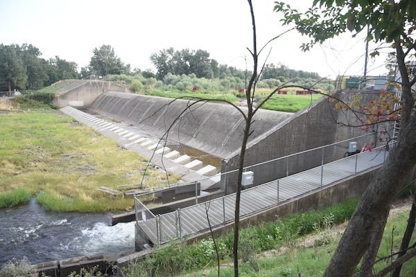 The Mill Creek Diversion Dam and fish ladder (fish ladder is under the grate) in August.  Water flows are low.