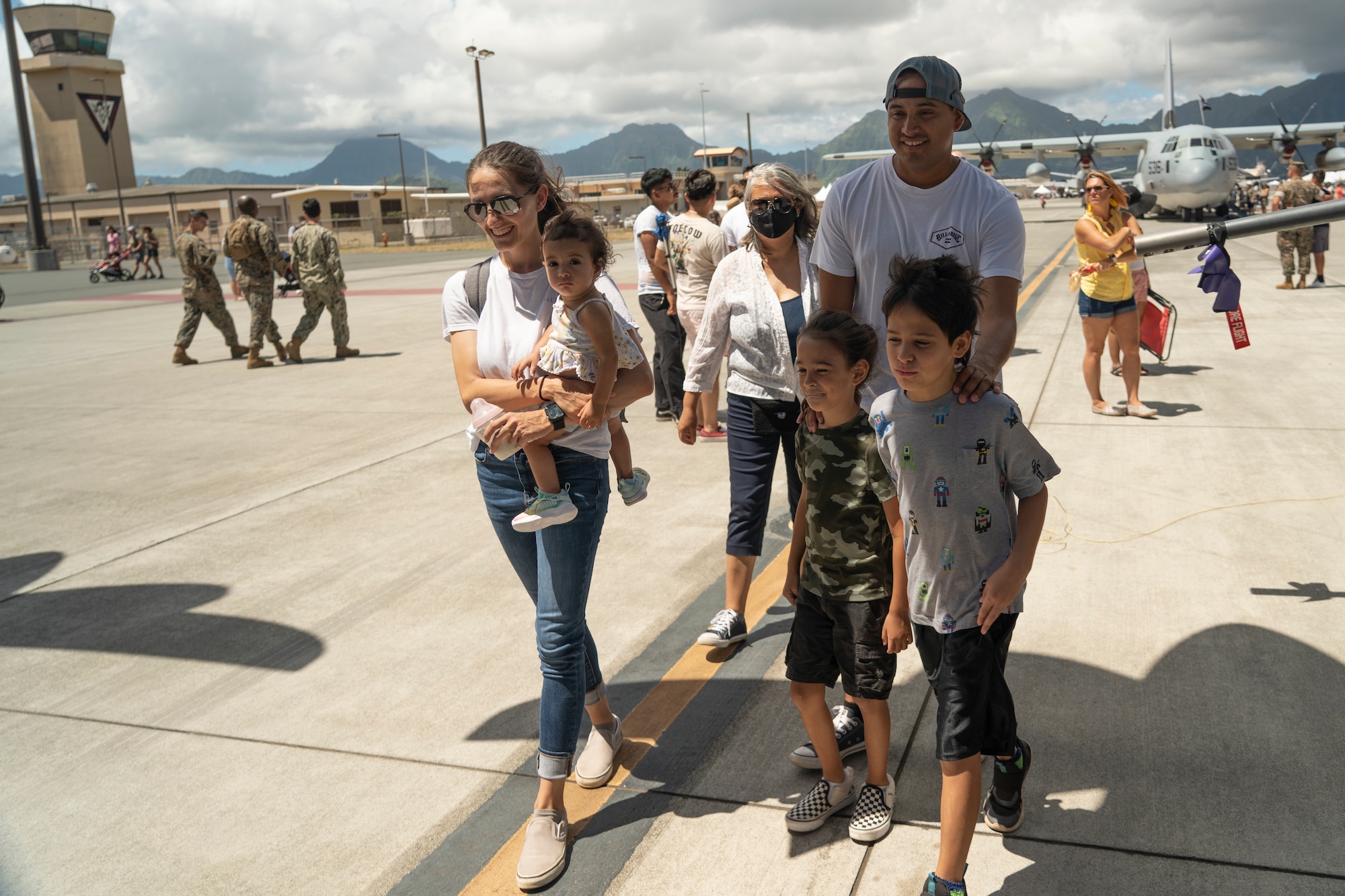Airshow attendees tour an aircraft.