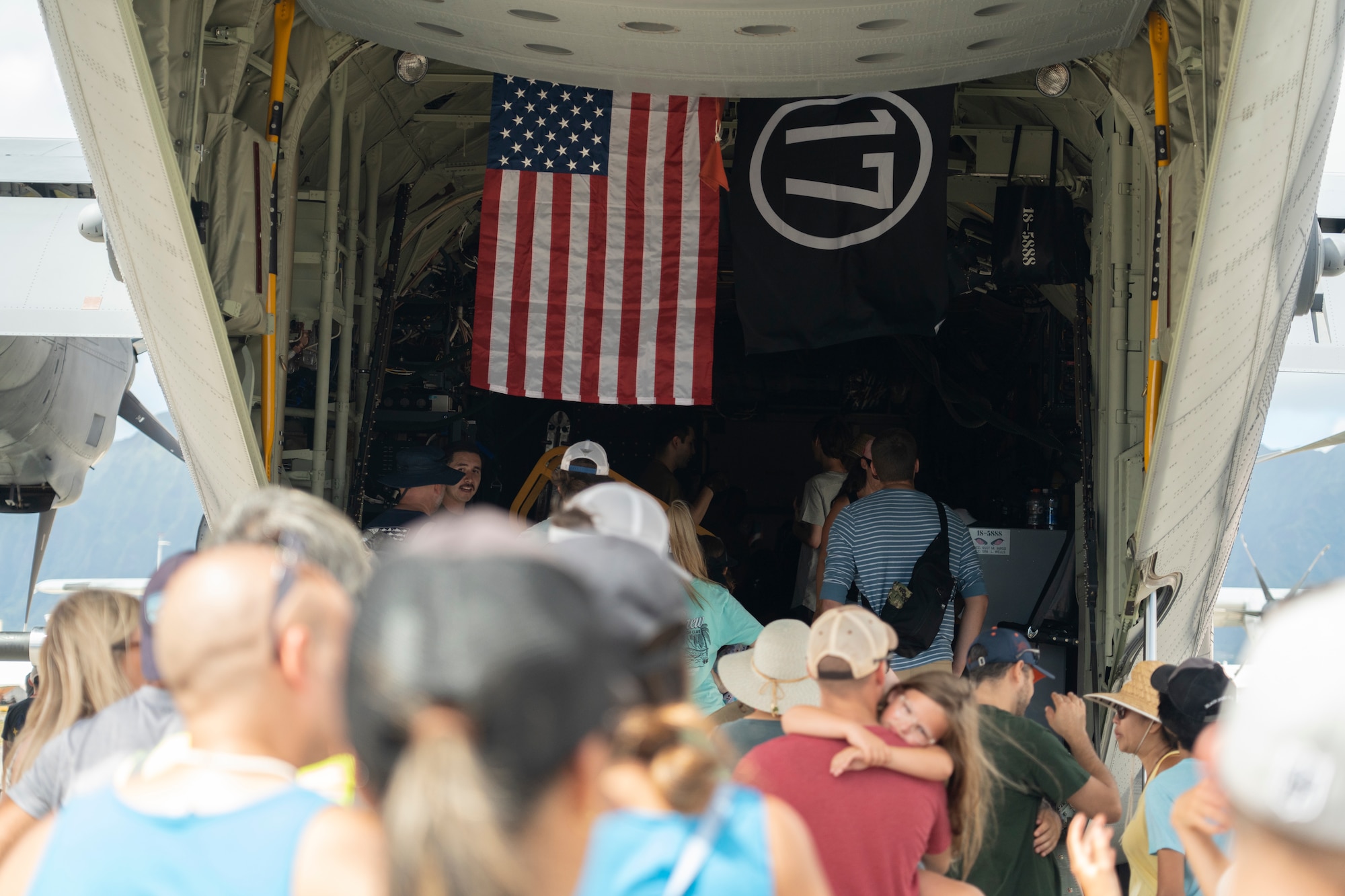 Airshow attendees tour an aircraft.
