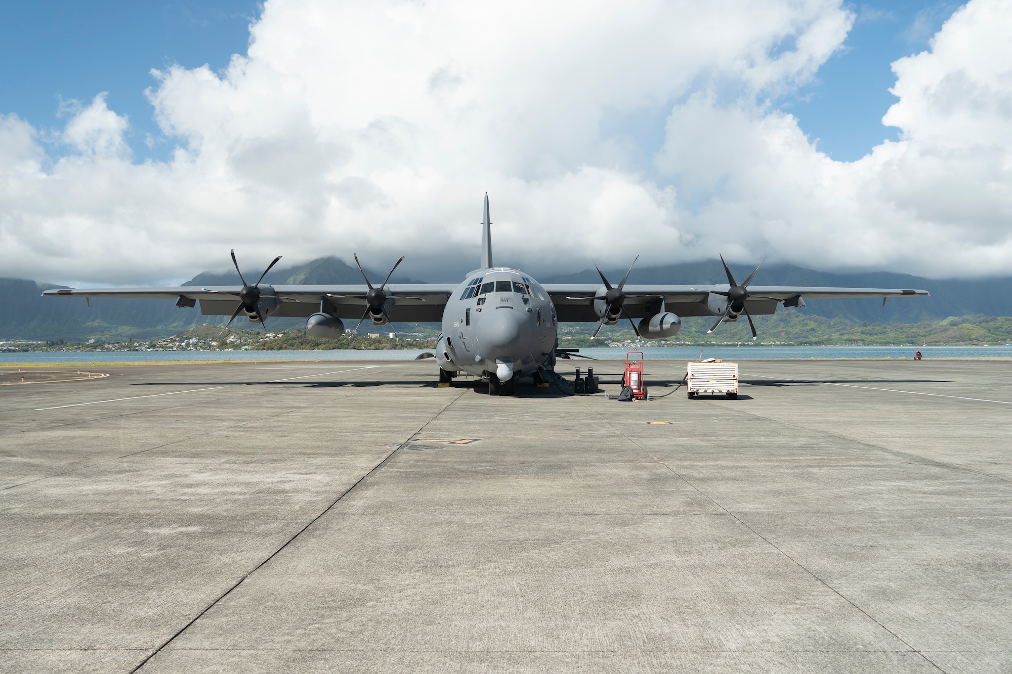 An aircraft is parked on the flightline in Hawaii.
