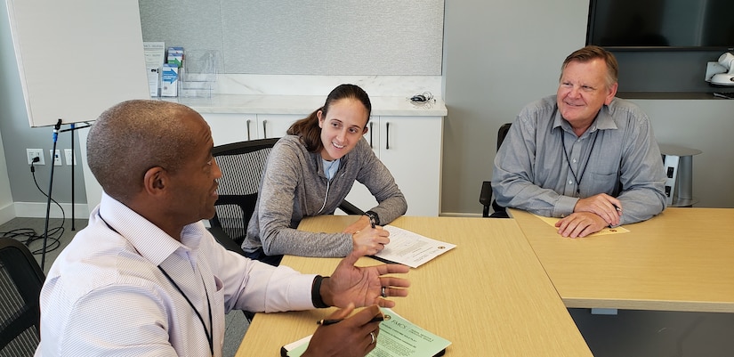 Student mediators, Gary Ratcliffe, Master Sgt. Lesli Pape and Donald Satterlee, role play during a mock mediation scenario of the Advanced Mediation course held in Washington, D.C., Aug. 31, 2022. The Department of the Air Force partnered with the Federal Mediation and Conciliation Service to bring about this training. (Courtesy photo by Kimberly Mlinaz)