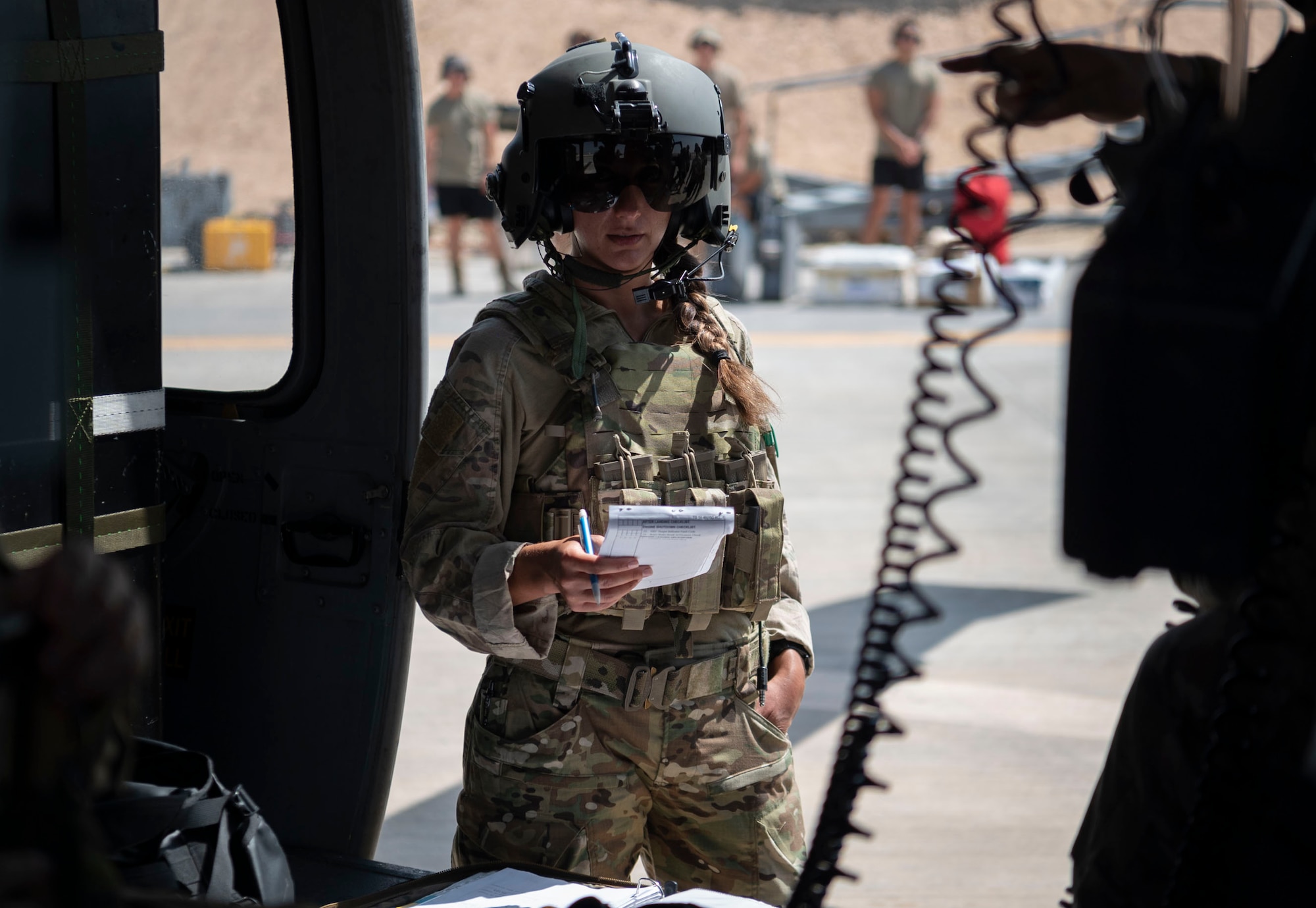 U.S. Air Force Major Grace Gibbens, 46th Expeditionary Rescue Squadron Pilot, flies the HH-60 Pave Hawk around Area Of Responsibility (AOR).