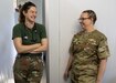 South African Defense Force Candidate Officer Connie Swanepoel and U.S. Army Maj. Sage Umpheries, both veterinarians, enjoy a short break between surgeries during a spay and neuter event at Empangeni Clinic during MEDREX 2022-South Africa, July 26, 2022. MEDREX is a medical training exercise, planned and executed by the United States Army Southern European Task Force, Africa, that allows the U.S. military to increase cooperation and overcome degraded environments and find effective medical resolutions. MEDREX 2022-South Africa is part of the larger Exercise Shared Accord taking place July 11-27, 2022 in the KwaZulu-Natal province. (U.S. Army National Guard photo by Staff Sgt. Jeff Clements)
