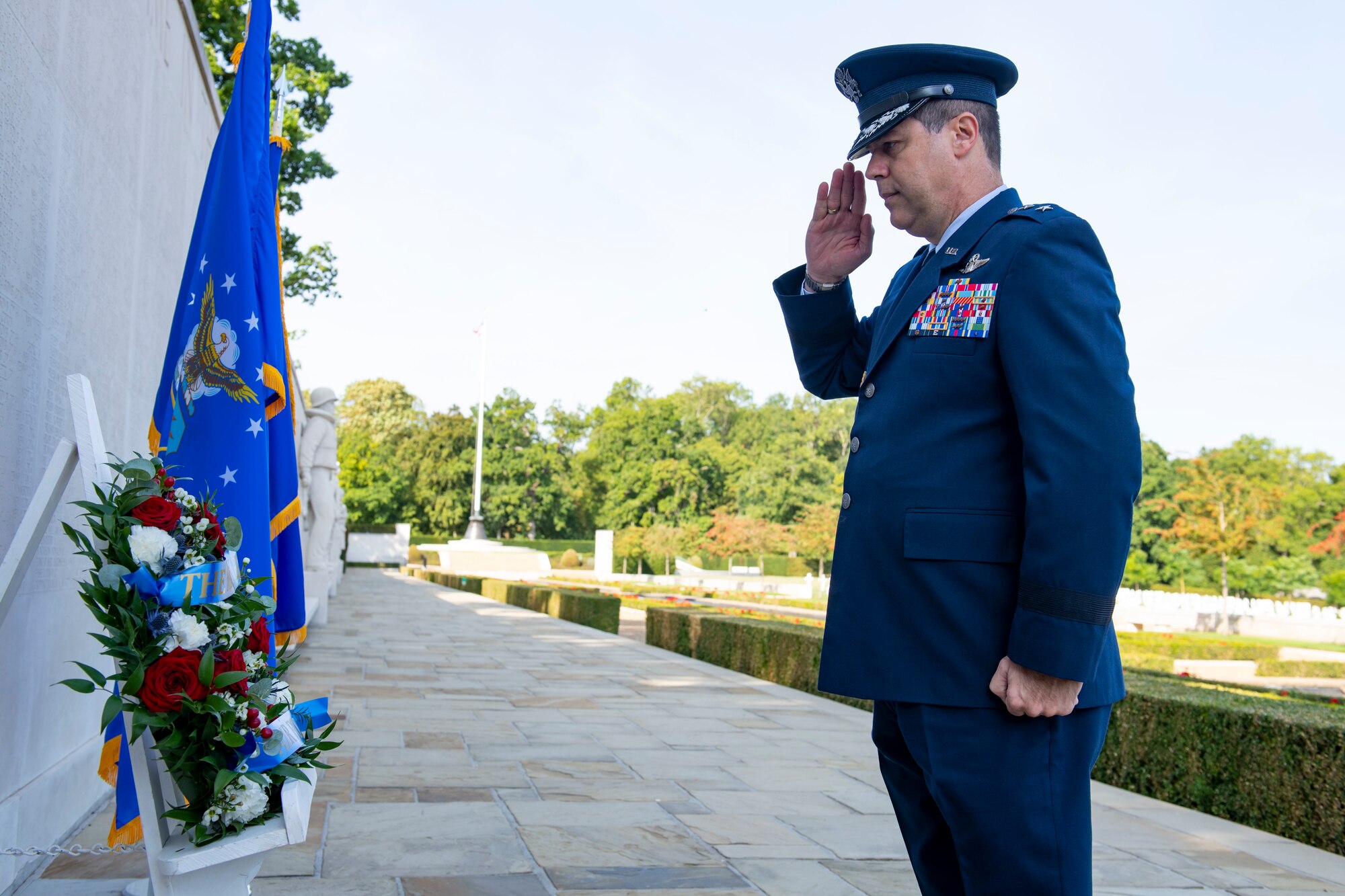 U.S. Air Force Maj. Gen. Andrew Gebara, 8th Air Force and Joint-Global Strike Operations Center commander, salutes at the Cambridge American Cemetery and Memorial, Madingley, England, Sept. 1, 2022. Leadership from the 501st Combat Support Wing joined the 8th Air Force commander and command chief, along with other U.S. Air Force leaders, to mark the 80th Anniversary of the formation of the Mighty Eighth Air Force and to commemorate those who gave their lives in the ultimate sacrifice. (U.S. Air Force photo by Senior Airman Jennifer Zima)