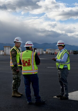 Bret Styers, senior program manager for the Ballistic Missile Defense Mandatory Center of Expertise at the U.S. Army Engineering and Support Center, Huntsville explains the engineering challenges of Alaskan projects during a tour of missile field 4 at Fort Greely, Alaska, with Col. Sebastien P. Joly, Huntsville Center commander, and Jason Wilson, program manager for the U.S. Army Corps of Engineers Alaska District, in August. (Photo by Kristen Bergeson)