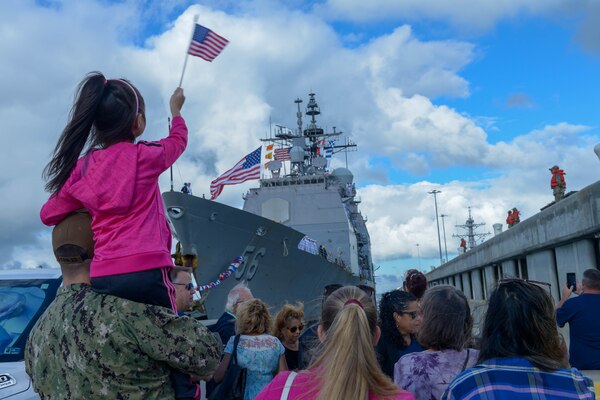 NORFOLK (Sept. 8, 2022) Family and friends of Sailors aboard the USS San Jacinto (CG-56) support the Sailor's homecoming at Naval Station Norfolk after a regularly scheduled deployment in the U.S. 5th Fleet and U.S. 6th Fleet areas of operations, Sept. 8. San Jacinto was deployed as part of the Harry S. Truman Carrier Strike Group in support of theater security cooperation efforts and to defen U.S, allied and partner interests. (U.S. Navy photo by Mass Communication Specialist 2nd Class Julia Johnson)