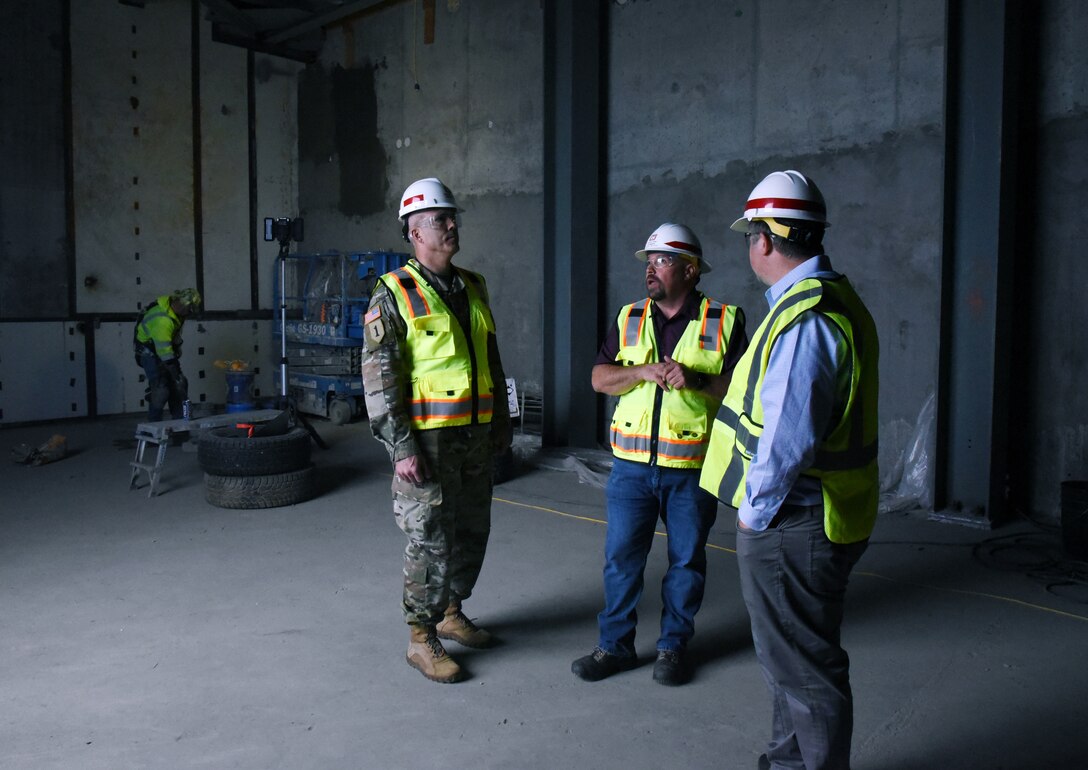 Joly, Styers and Wilson tour the Fort Greely Communications Center currently under construction at Fort Greely, Alaska. The new facility is expected to be completed in 2023. (Photo by Kristen Bergeson)