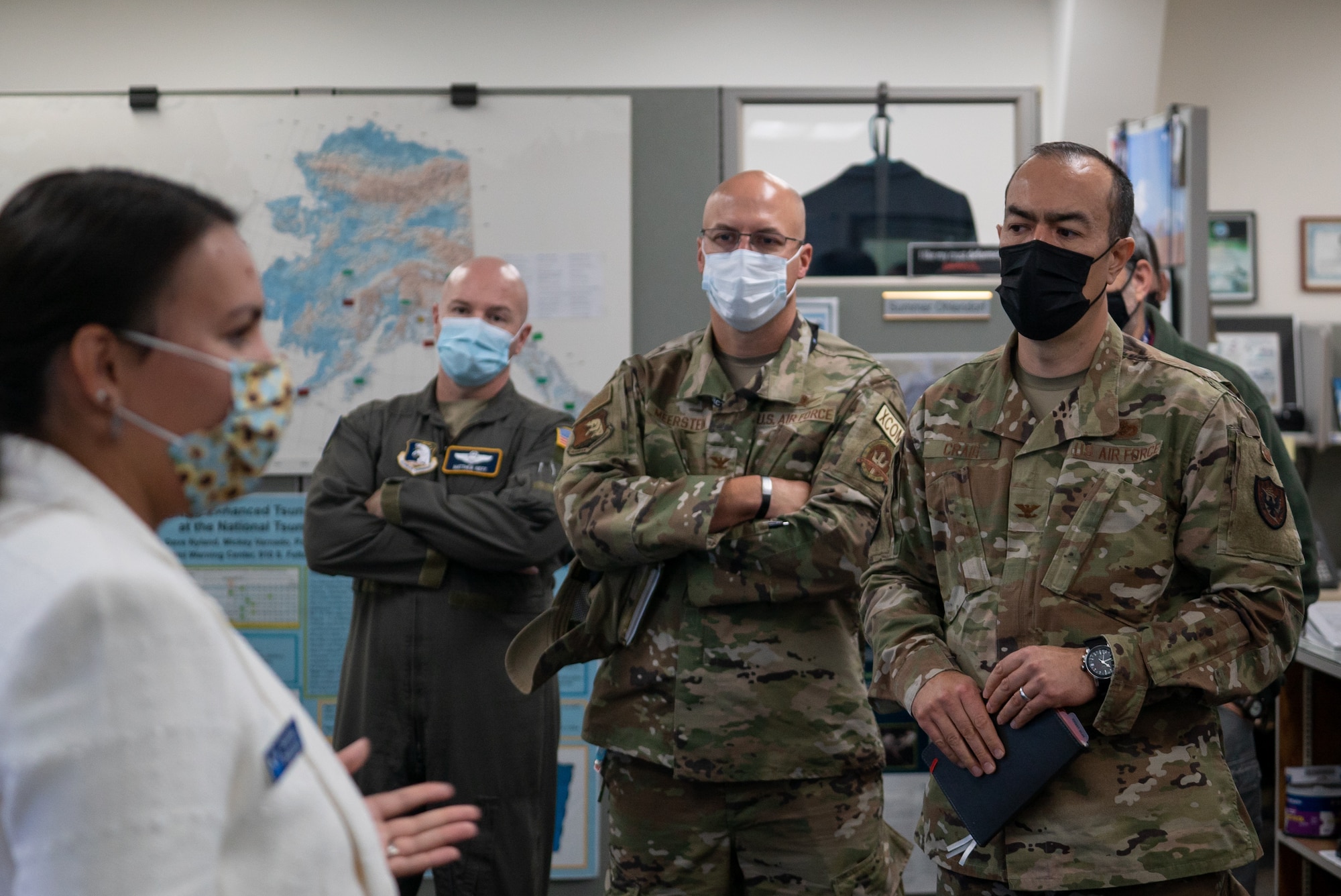 Alaskan Command senior leaders listen to Dr. Summer Ohlendorf explain data collection capabilities