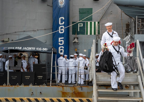 NORFOLK (Sept. 9, 2022) Sailors assigned to the USS San Jacinto (CG-56) depart the ship after returning to Naval Station Norfolk after a regularly scheduled deployment in the U.S. 5th Fleet and U.S. 6th Fleet areas of operations, Sept. 8. San Jacinto was deployed as part of the Harry S. Truman Carrier Strike Group in support of theater security cooperation efforts and to defend U.S., allied and partner interests. (U.S. Navy photo by Mass Communication Specialist 1st Class Ryan Seelbach)