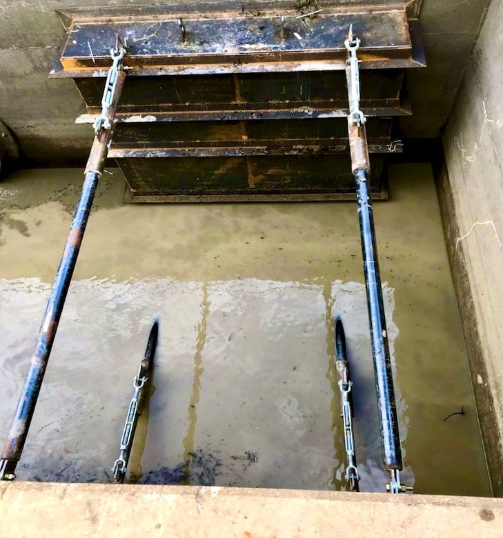 The Memphis District's Revetment Branch and Metals Units recently finalized a flapgate repair on what’s called the “Fritz Landing Culvert” in Lake County, Tennessee, in August 2022. 

“In 2021, the flapgate on the river side end of one of the culverts became loose, fractured, and fell off,” Project Manager Mark Mazzone said. “The flapgates ensure that flood water cannot back up through the culverts. They also provide the actual protection against flooding through culvert openings in the levee.”  

To repair the flapgates, construction involved building temporary cofferdams, pumping standing water to access the end of the culvert, fabrication and installation of temporary structures, and fabrication/installation of a replacement collar and supporting structure. (Courtesy photo)