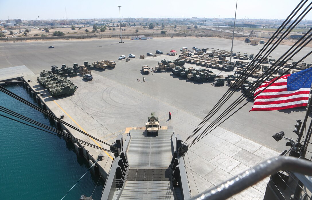 U.S. Marines with Combat Logistics Regiment 1, 1st Marine Logistics Group, drive a tactical vehicle onto the USNS Seay during exercise Native Fury 22 at Yanbu Commercial Port, Kingdom of Saudi Arabia, Aug. 26, 2022. The Kingdom of Saudi Arabia enables the U.S. Marine Corps Central Command and U.S. Central Command to receive and employ forces and resources rapidly in the region through a growing network of western geographic access and staging points.