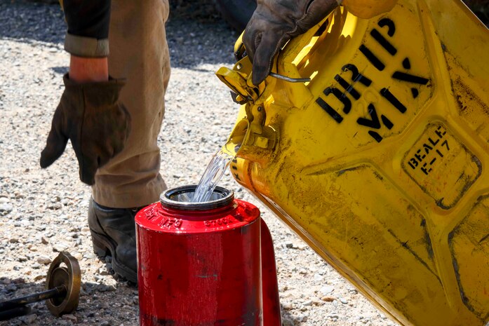 Crew members of the Air Force Civil Engineer Center Wildland Fire Support Module conduct a prescribed fire, also known as a controlled burn, on June 6th, 2022 at Beale Air Force Base, Calif.