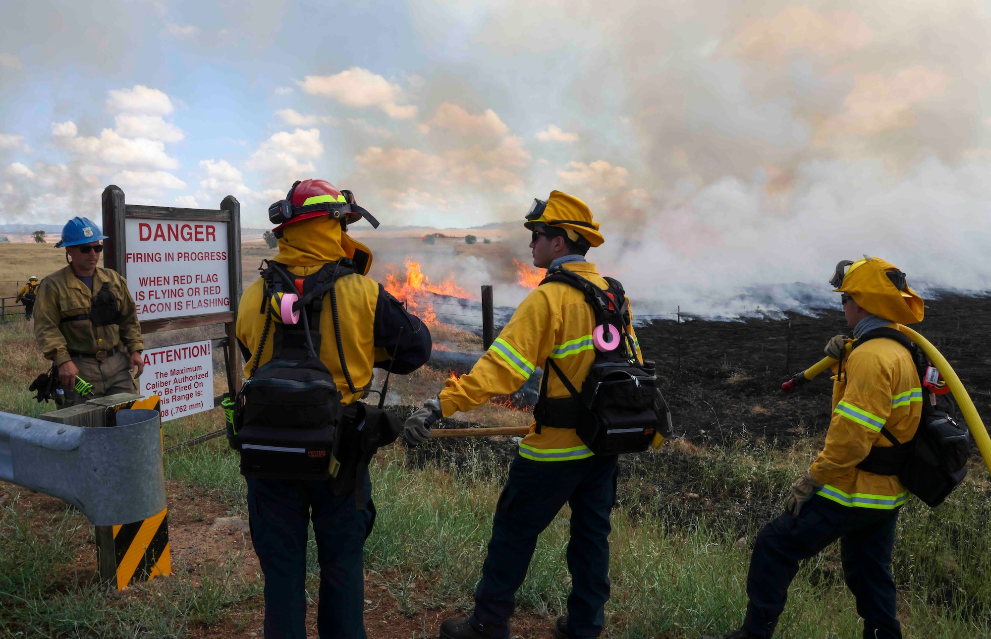 Crew members of the Air Force Civil Engineer Center Wildland Fire Support Module conduct a prescribed fire, also known as a controlled burn, on June 6th, 2022 at Beale Air Force Base, Calif.