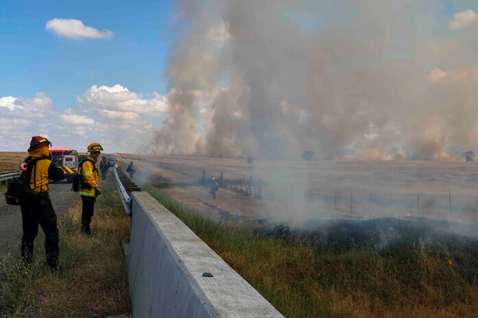 Crew members of the Air Force Civil Engineer Center Wildland Fire Support Module conduct a prescribed fire, also known as a controlled burn, on June 6th, 2022 at Beale Air Force Base, Calif.