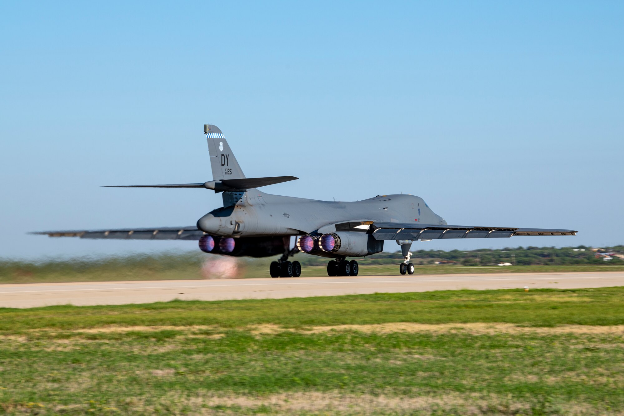 A B-1B Lancer takes off from the flightline at Dyess Air Force Base, Texas Sept. 7th, 2022, for a Bomber Task Force mission to U.S. Southern Command. This mission is representative of the United States’ commitment to our partners to maintain regional security and stability while enabling units to become familiar with operations in different regions. (U.S. Air Force photo by Senior Airman Mercedes Porter)