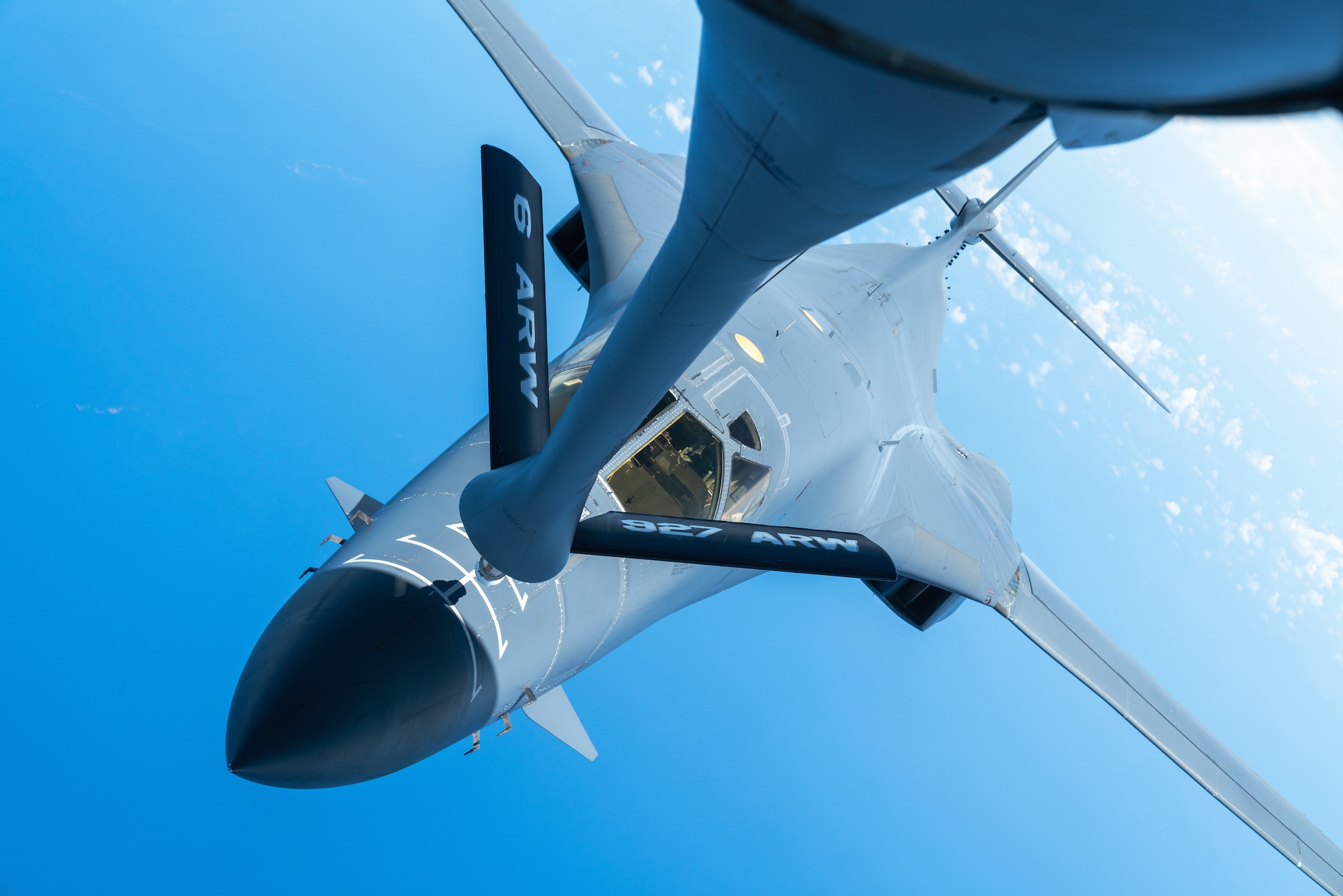 A B-1B Lancer aircraft assigned to the 7th Bomb Wing, Dyess Air Force Base, Texas, receives fuel from a KC-135 Stratotanker aircraft assigned to the 927th Air Refueling Wing, MacDill AFB, Florida, over the Caribbean Sea, Sept. 7, 2022. The air operations between 12th Air Force and Air Mobility Command were part of a Partner Interoperability Training exercise with Panama and Ecuador to grow capacity, enhance the ability to respond to illegal fishing practices and maintain shared interest in regional security. Multilateral engagements such as this one ensures maximum resource efficiency and enable the consistent training between U.S. Southern Command, component command and partner nations. (U.S. Air Force photo by Airman 1st Class Joshua Hastings)