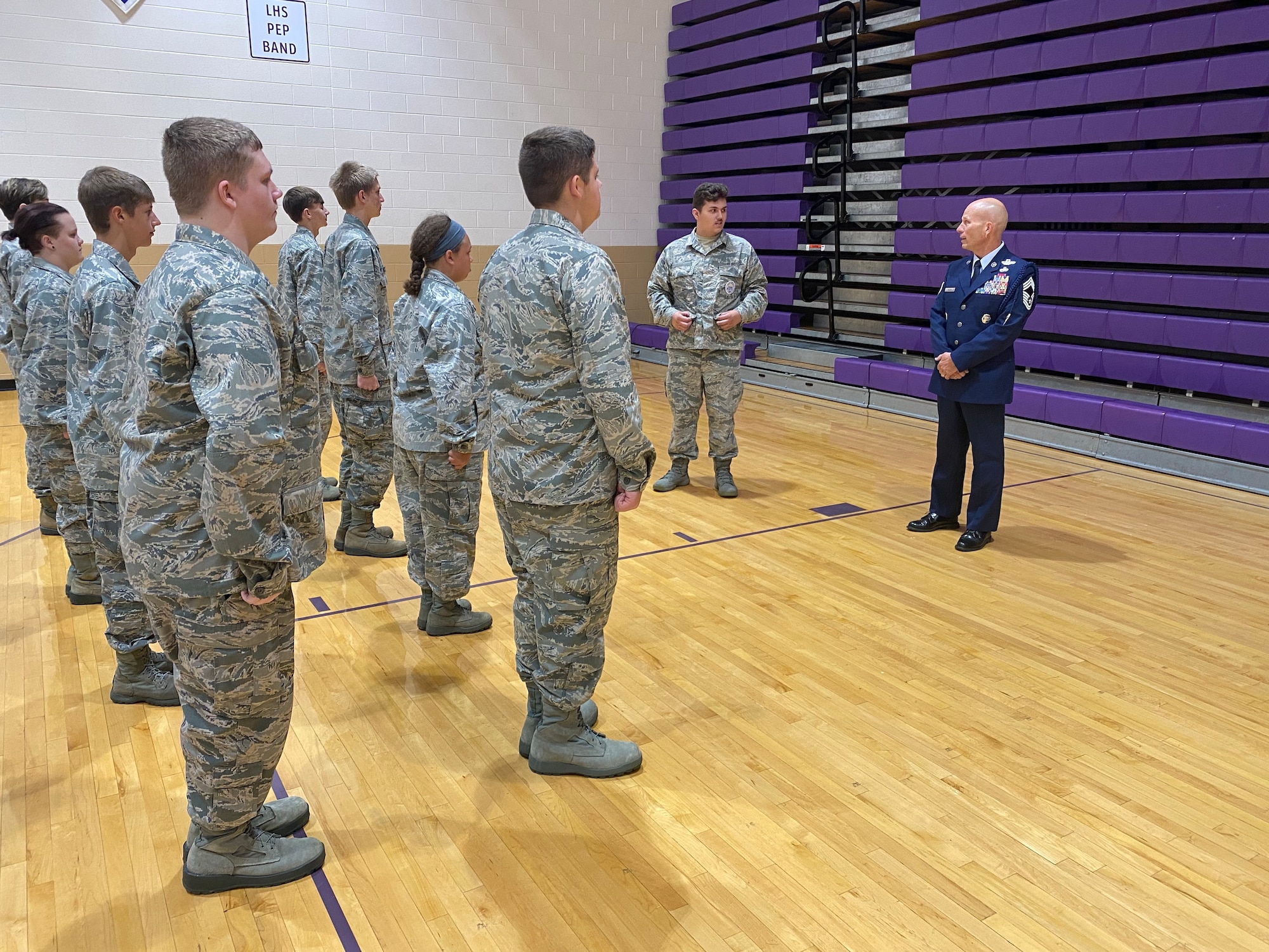 Retired Chief Master Sgt. David Dillon, an Air Force Junior ROTC Aerospace Science Instructor, teaches marching techniques to cadets at Logan High School in Logan, Ohio, Aug. 29, 2022.  Logan High School received approval to start an Air Force Junior ROTC program last year, and the program started its first full academic year in August of 2022