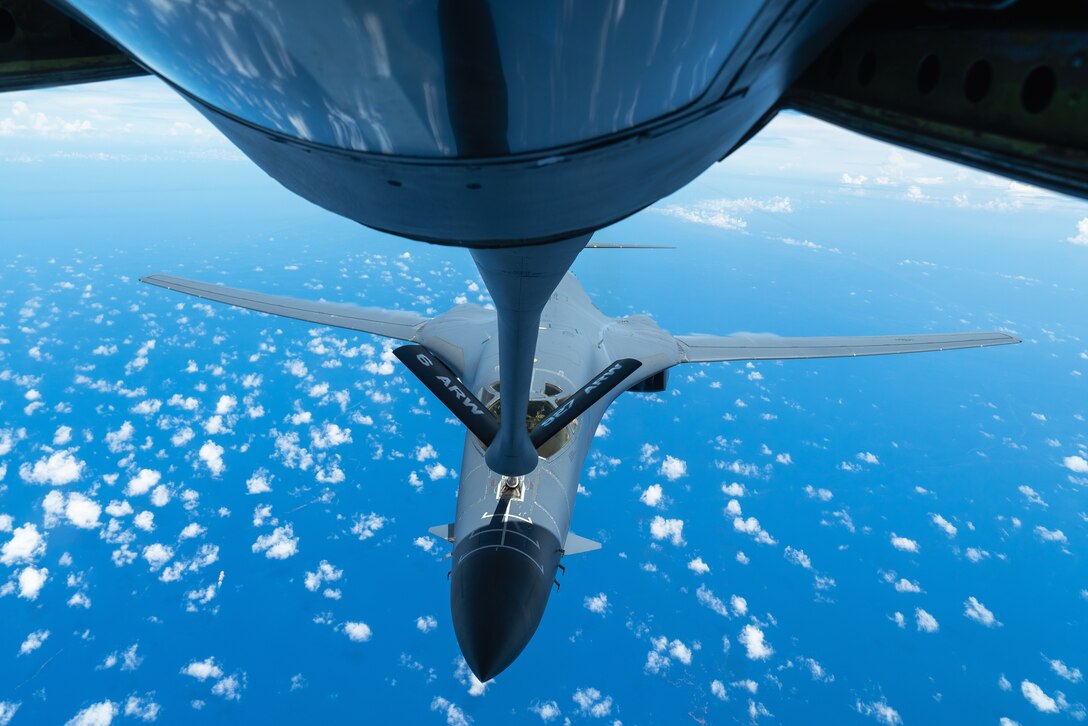 A B-1B Lancer aircraft assigned to the 7th Bomb Wing, Dyess Air Force Base, Texas, receives fuel from a KC-135 Stratotanker aircraft assigned to the 927th Air Refueling Wing, MacDill AFB, Florida, over the Caribbean Sea, Sept. 7, 2022. The air operations between 12th Air Force and Air Mobility Command were part of a Partner Interoperability Training exercise with Panama and Ecuador to grow capacity, enhance the ability to respond to illegal fishing practices and maintain shared interest in regional security. Multilateral engagements such as this one ensures maximum resource efficiency and enable the consistent training between U.S. Southern Command, component command and partner nations. (U.S. Air Force photo by Airman 1st Class Joshua Hastings)