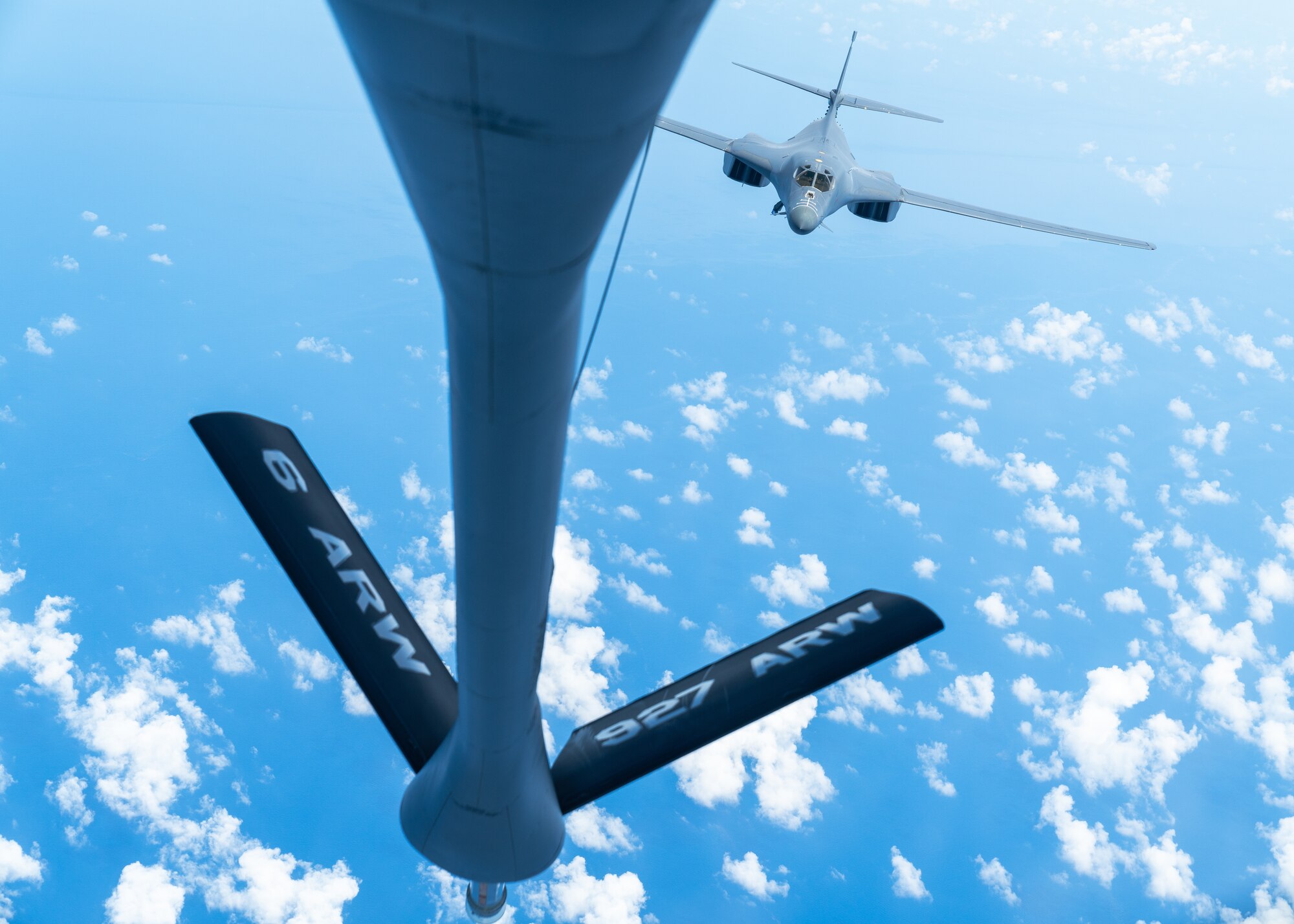 A B-1B Lancer aircraft assigned to the 7th Bomb Wing, Dyess Air Force Base, Texas, approaches a KC-135 Stratotanker aircraft assigned to the 927th Air Refueling Wing, MacDill AFB, Florida, to receive fuel over the Caribbean Sea, Sept. 7, 2022. The air operations between 12th Air Force and Air Mobility Command were part of a Partner Interoperability Training exercise with Panama and Ecuador to grow capacity, enhance the ability to respond to illegal fishing practices and maintain shared interest in regional security. Multilateral engagements such as this one ensures maximum resource efficiency and enable the consistent training between U.S. Southern Command, component command and partner nations. (U.S. Air Force photo by Airman 1st Class Joshua Hastings)