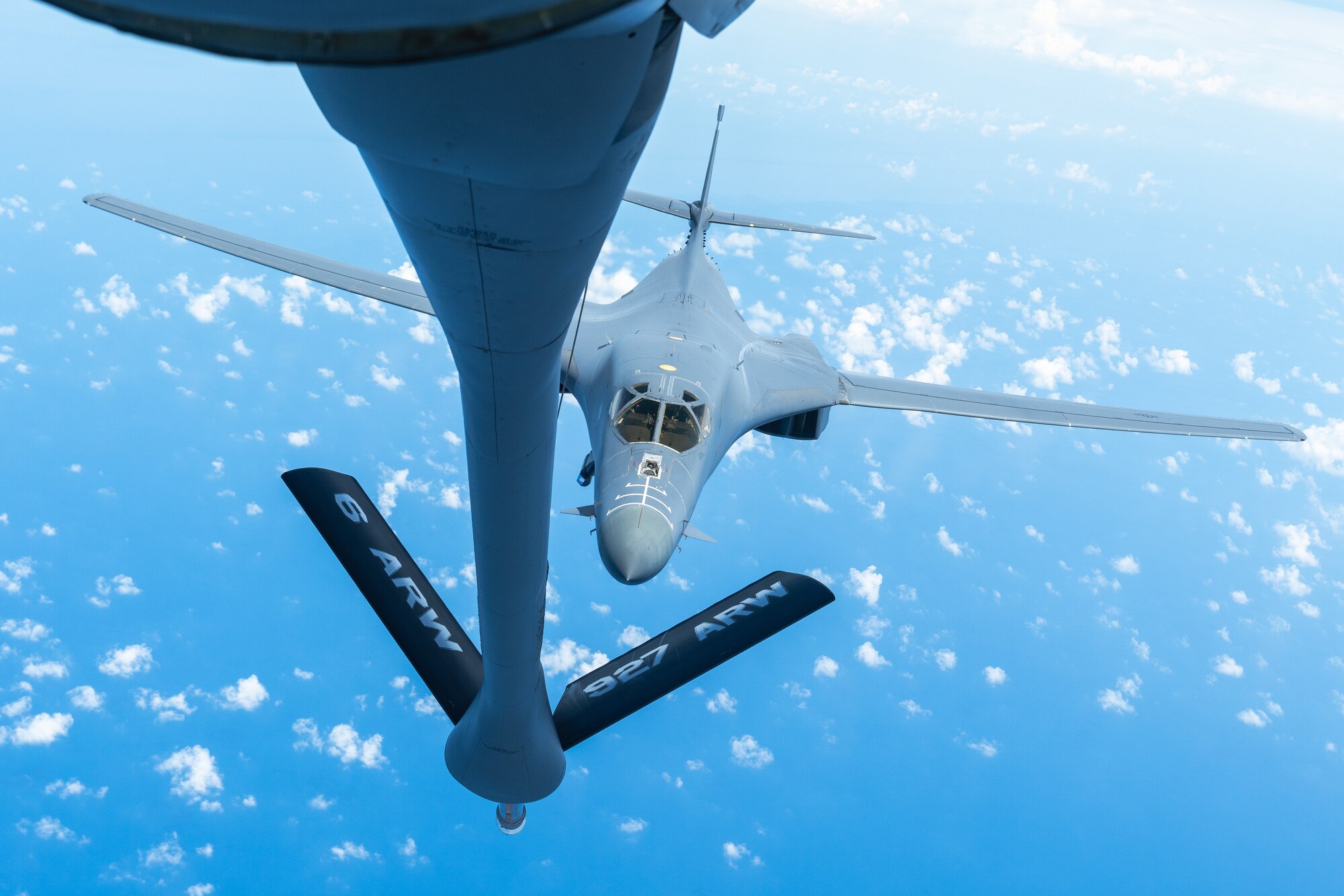 A B-1B Lancer aircraft assigned to the 7th Bomb Wing, Dyess Air Force Base, Texas, approaches a KC-135 Stratotanker aircraft assigned to the 927th Air Refueling Wing, MacDill AFB, Florida, to receive fuel over the Caribbean Sea, Sept. 7, 2022. The air operations between 12th Air Force and Air Mobility Command were part of a Partner Interoperability Training exercise with Panama and Ecuador to grow capacity, enhance the ability to respond to illegal fishing practices and maintain shared interest in regional security. Multilateral engagements such as this one ensures maximum resource efficiency and enable the consistent training between U.S. Southern Command, component command and partner nations. (U.S. Air Force photo by Airman 1st Class Joshua Hastings)