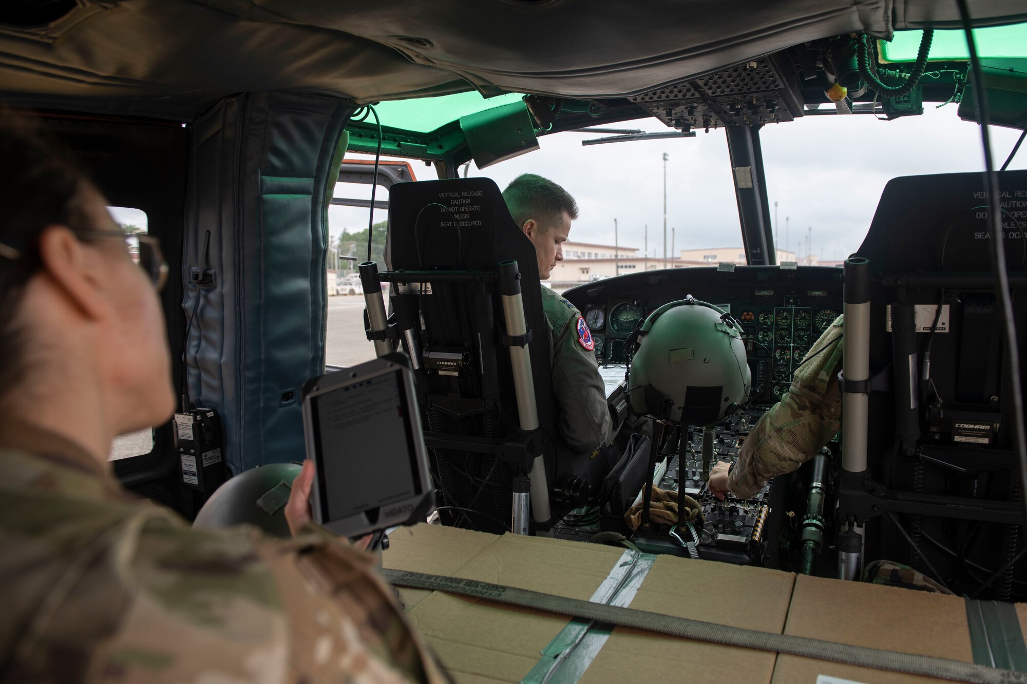 A 459th Airlift Squadron crew performs a flight check on a UH-1N Iroquois prior to take off for a Tokyo Metropolitan Government hosted disaster preparedness and response drill at Tokyo Rinkai Disaster Prevention Park, Japan, Sept. 3, 2022. This training allows the 459th AS to better integrate with the Government of Japan and respond faster during a real-world scenario. (U.S. Air Force photo by Tech. Sgt. Joshua Edwards)