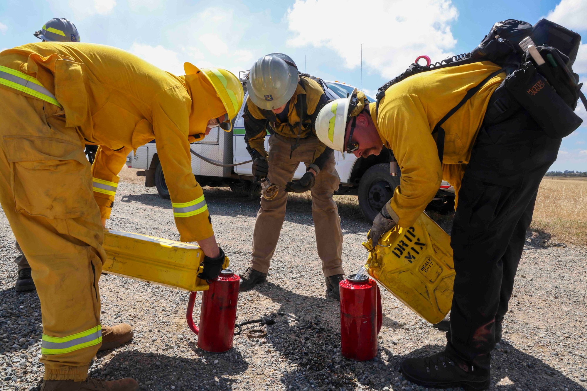 Crew members of the Air Force Civil Engineer Center Wildland Fire Support Module conduct a prescribed fire, also known as a controlled burn, on June 6th, 2022 at Beale Air Force Base, Calif.