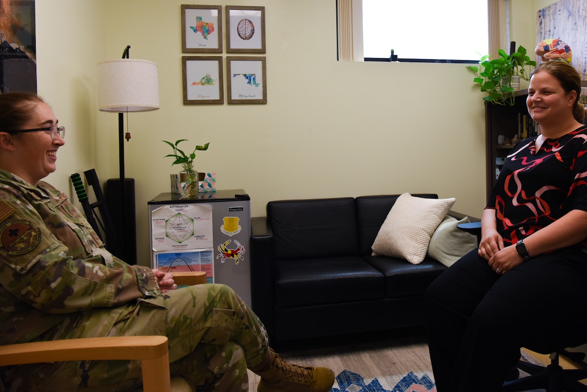 U.S. Air Force Staff Sgt. Samantha Gilbert, 17th Operational Medical Readiness Squadron’s mental health flight chief, consults with Dr. Michelle Hanby, clinical psychologist,17th Medical Group mental health element director and acting 17th OMRS mental health flight commander, at the Ross Clinic mental health flight building, Goodfellow Air Force Base, Texas, August 22, 2022. Mental health technicians work closely with providers to coordinate delivery of timely and quality mental health care. (U.S. Air Force photo by Senior Airman Michael Bowman)
