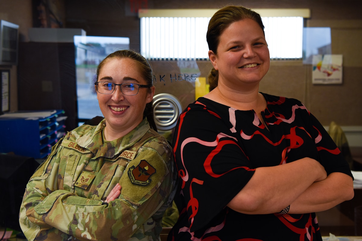 U.S. Air Force Staff Sgt. Samantha Gilbert, 17th Operational Medical Readiness Squadron’s mental health flight chief, poses with Dr. Michelle Hanby, clinical psychologist, 17th Medical Group mental health element director and acting mental health flight commander, at the Ross Clinic mental health flight building, Goodfellow Air Force Base, Texas, August 22, 2022. U.S. Air Force Lt. Col. Jeremy Pallas, Air Education and Training Command mental health branch chief, selected the 17th OMRS mental health flight as AETC’s sole unit to test the targeted care pilot program. (U.S. Air Force photo by Senior Airman Michael Bowman)
