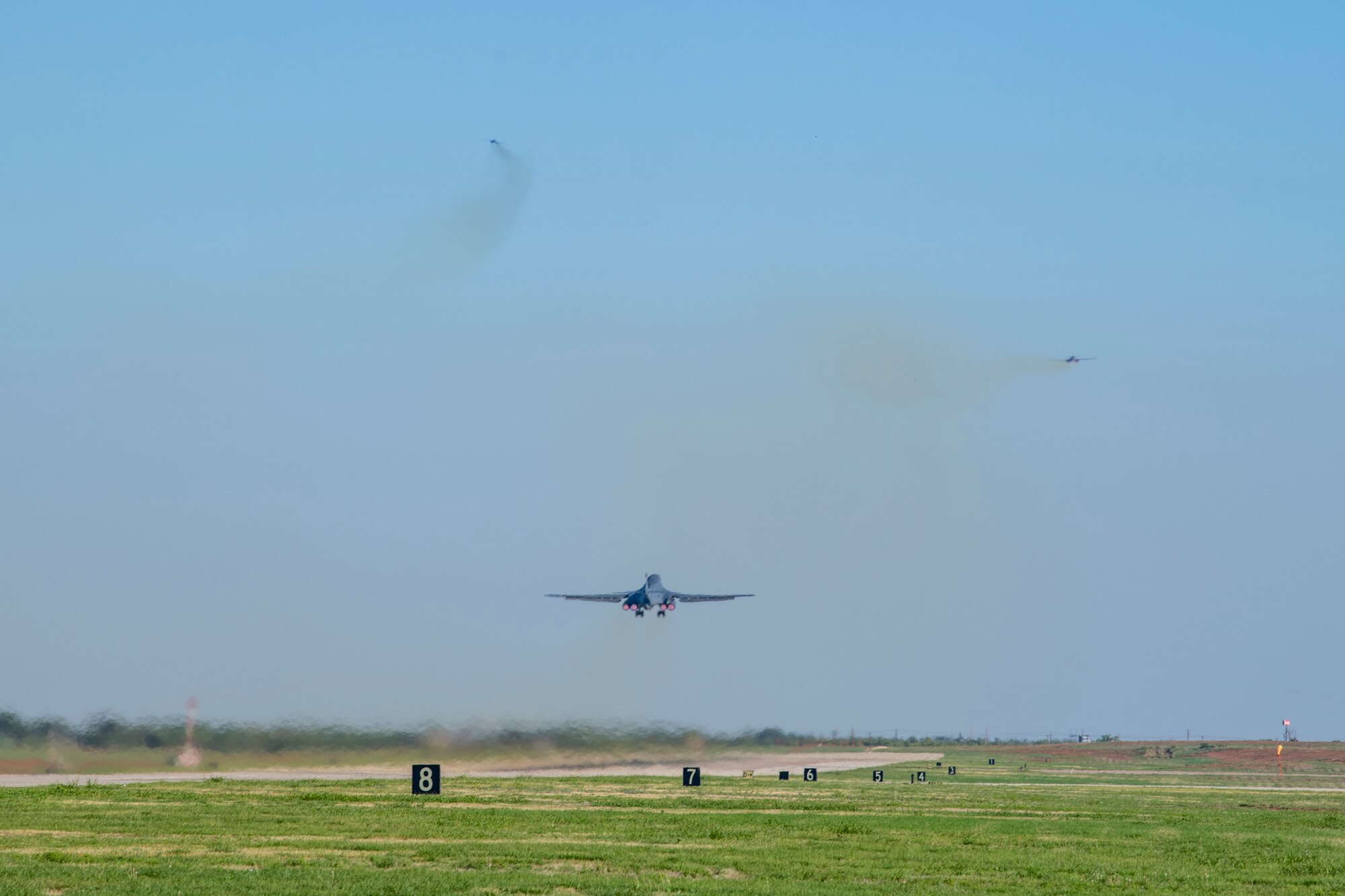 Three B-1B Lancers takeoff from Dyess Air Force Base, Texas Sept. 7th, 2022 for a Bomber Task Force mission to U.S. Southern Command. BTF missions familiarize aircrews with air bases and operations in different Geographic Combatant Commands and enable them to maintain a high state of readiness and proficiency, validating the U.S. Air Force Global Strike Command’s always-ready global strike capability. (U.S. Air Force photo by Senior Airman Mercedes Porter)