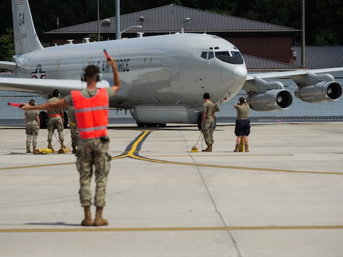 Photo shows Airman directing aircraft