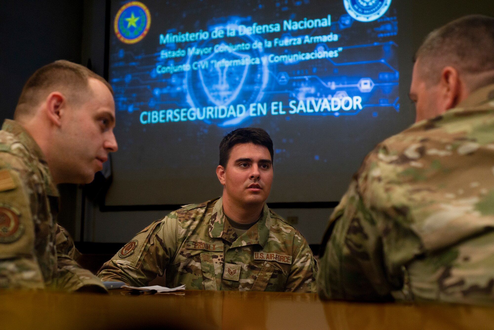 U.S. Airmen present cyber Powerpoint.